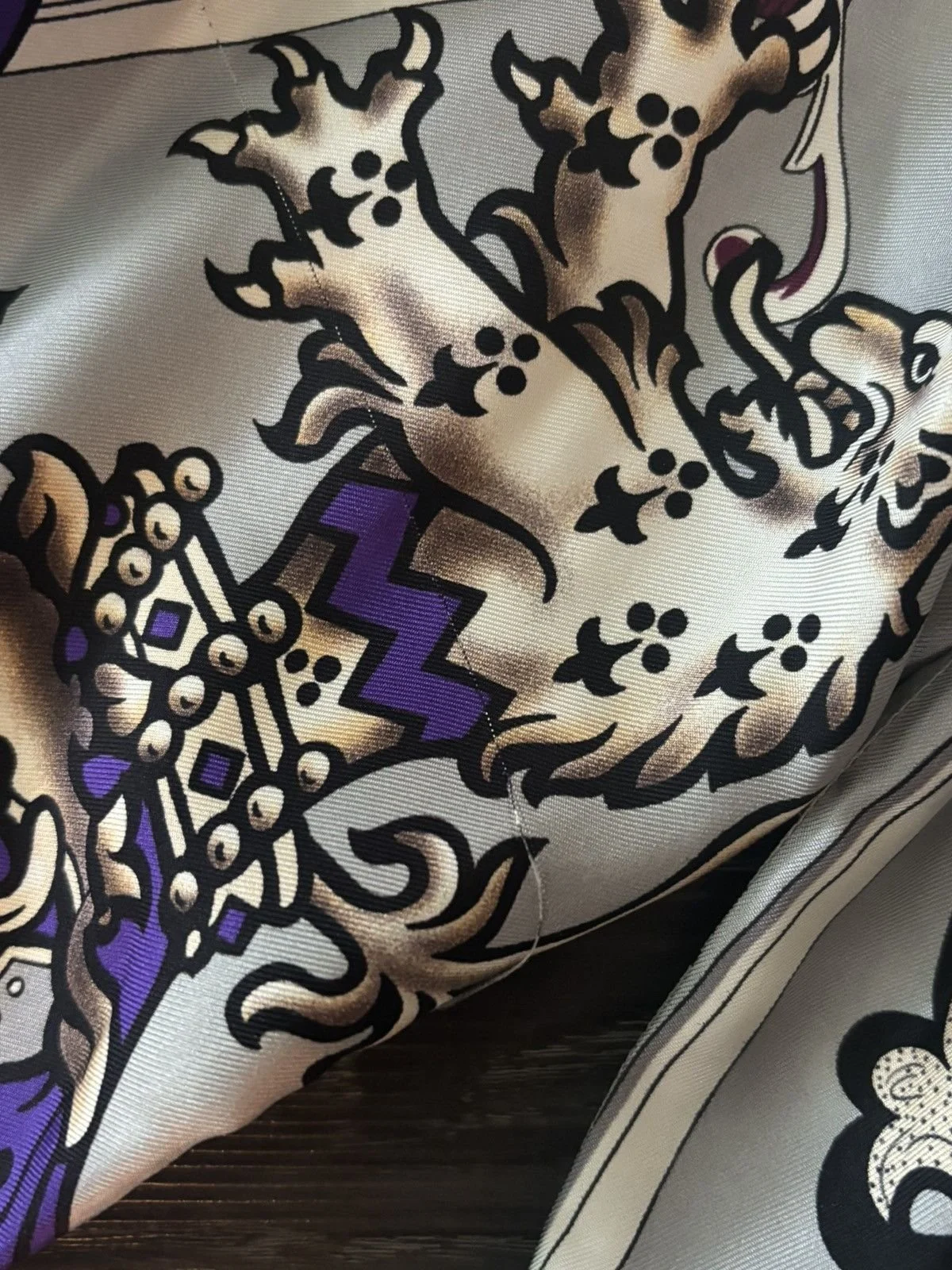 Miu Miu    2018 — Released as part of their reedition campaign; originally released in 2006.   Coat of Arms Button-Up  Size 42