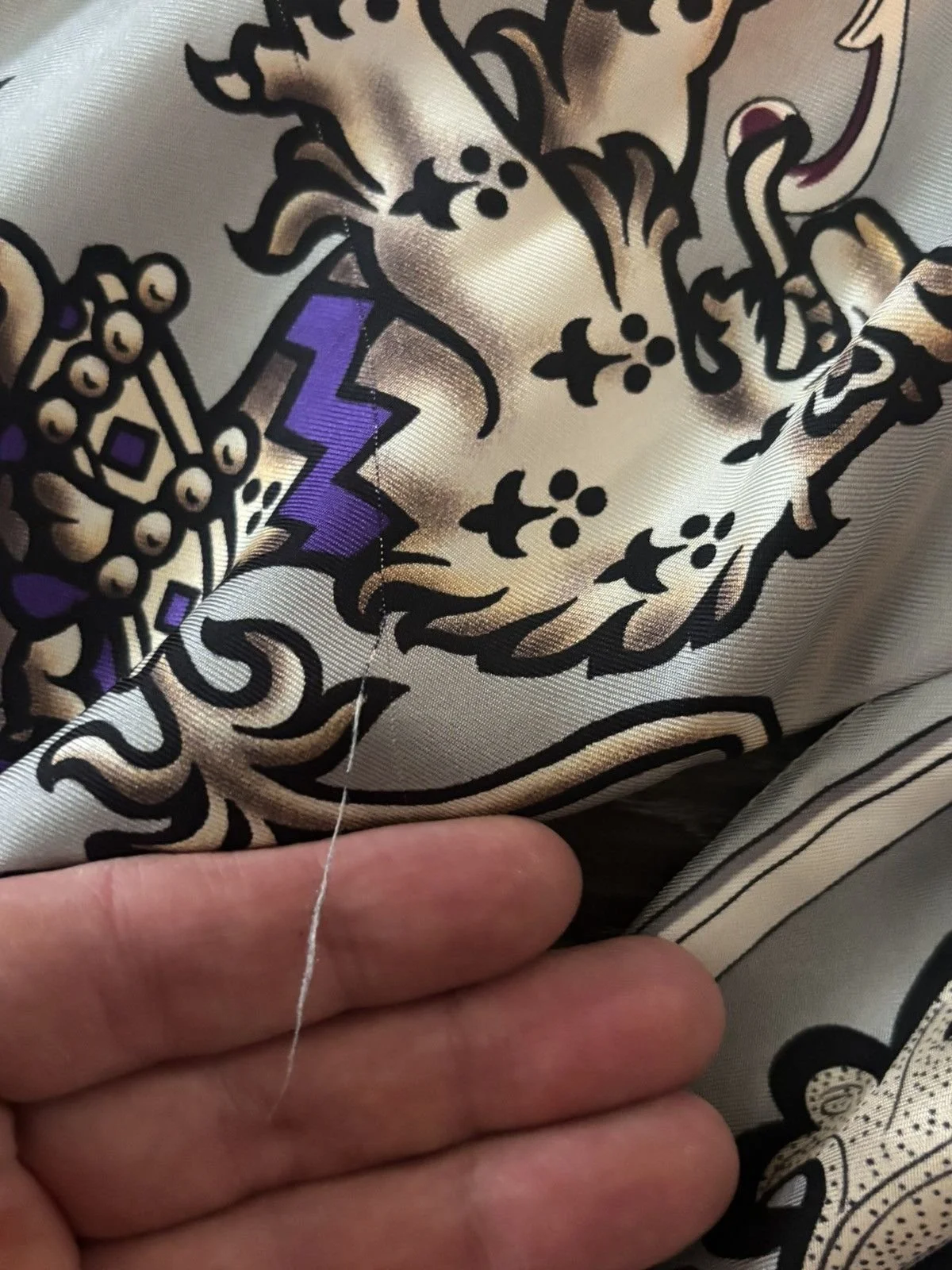 Miu Miu    2018 — Released as part of their reedition campaign; originally released in 2006.   Coat of Arms Button-Up  Size 42