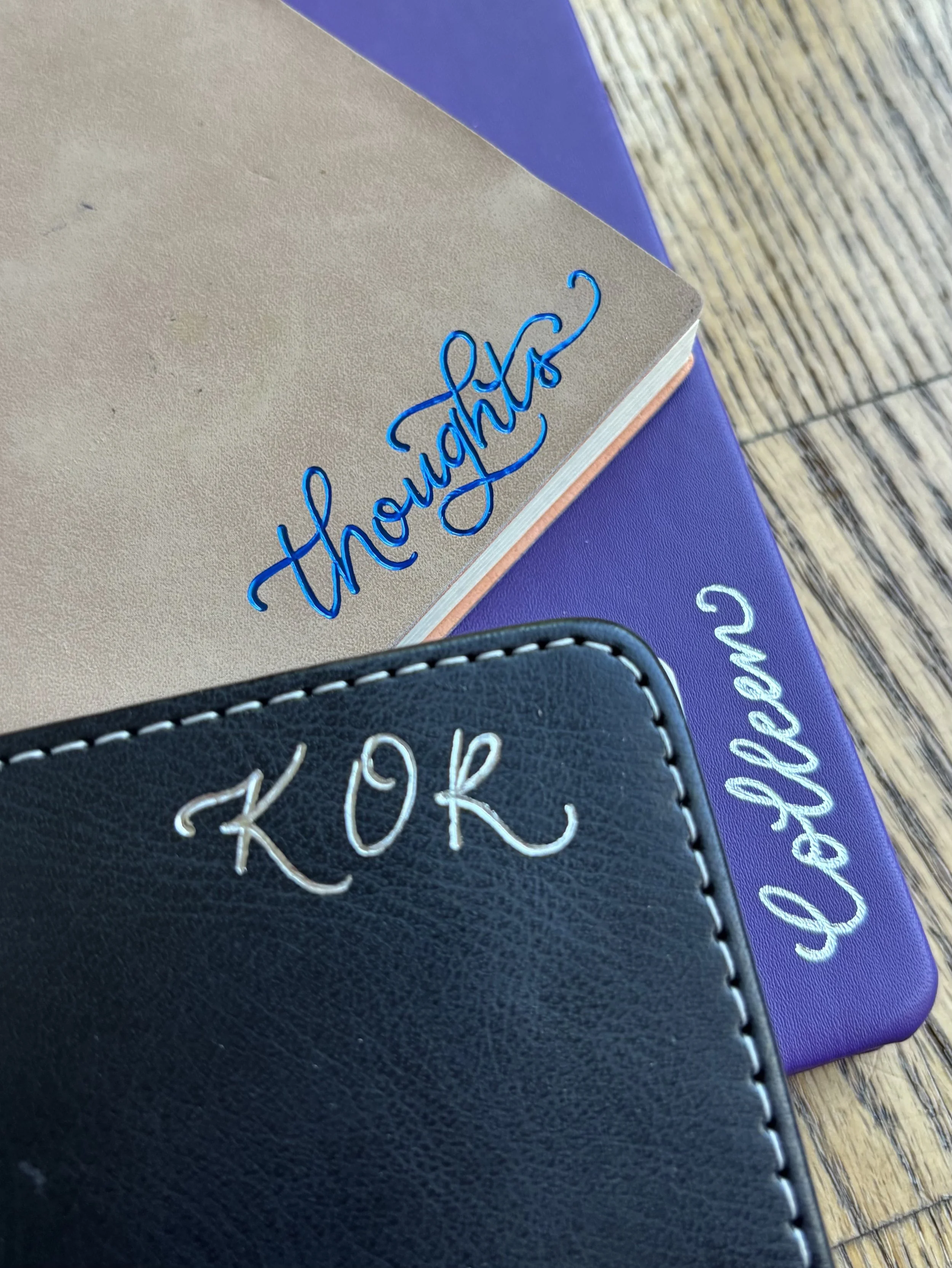notebooks personalized with hand written calligraphy in multicolored foil