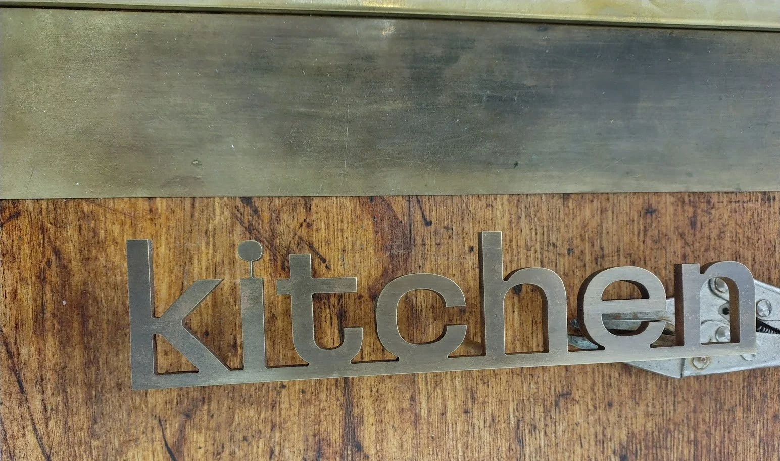 Custom aged and cut kitchen sign