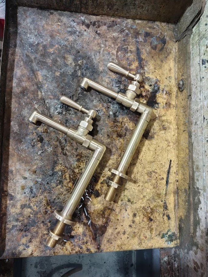Brushed pillar taps