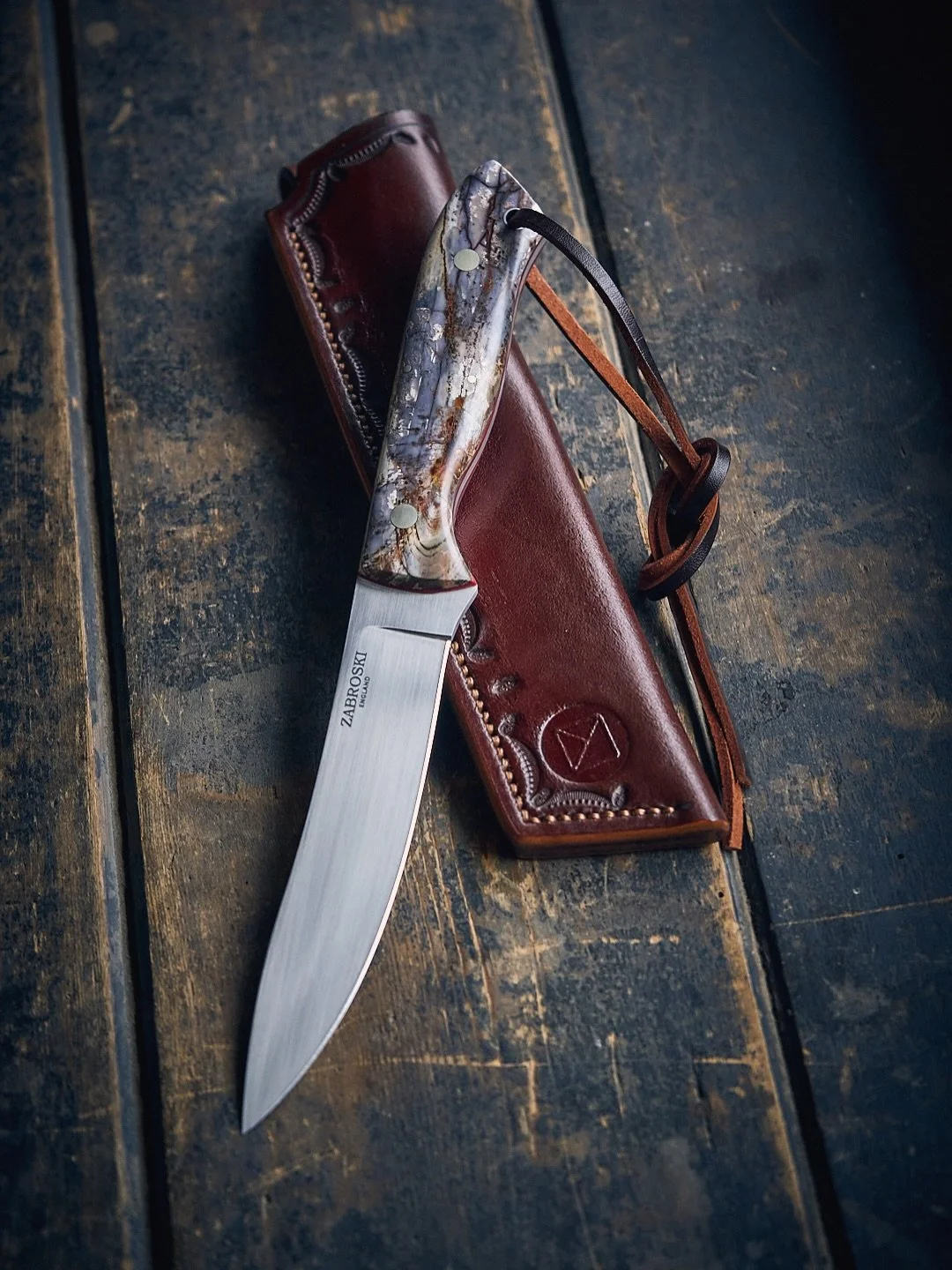 Custom 5&rdquo; version of my Huntsman model.

Woolly Mammoth Ivory, Wine liners, RWL34 stainless, and Nickel Silver hardware. 

Very on-brand.