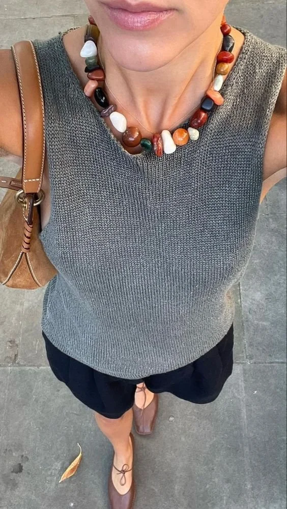 Chunky necklace + knit tank.