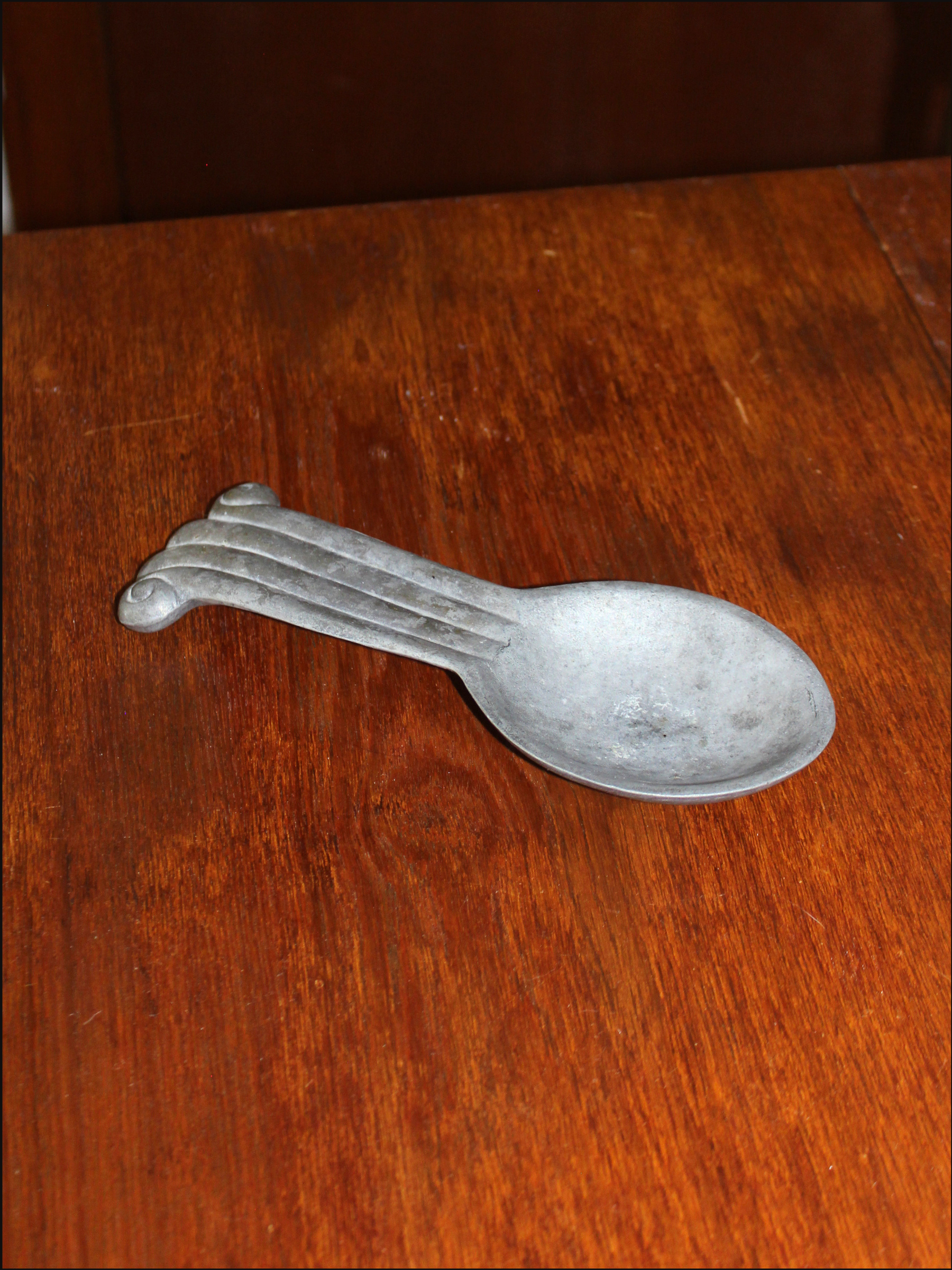 pewter spoon rest cover.png