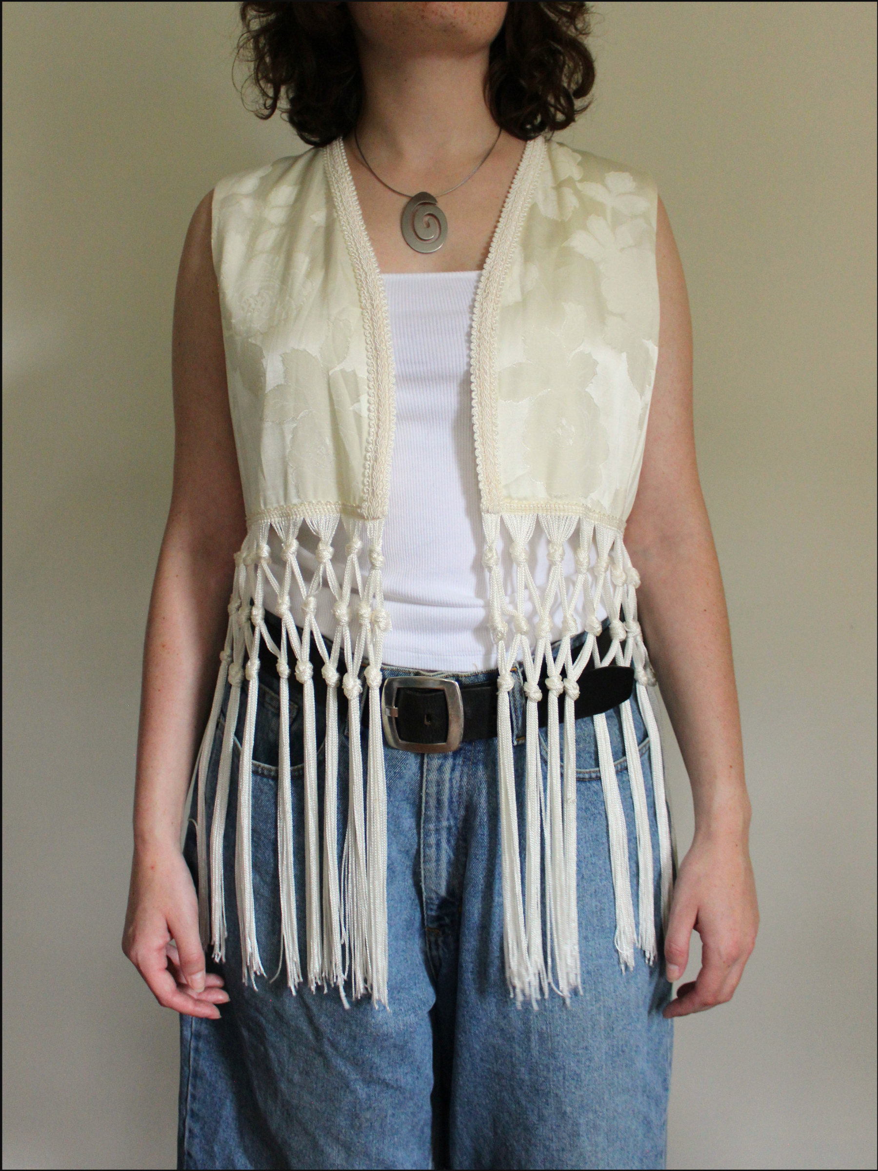 fringe vest cover.png