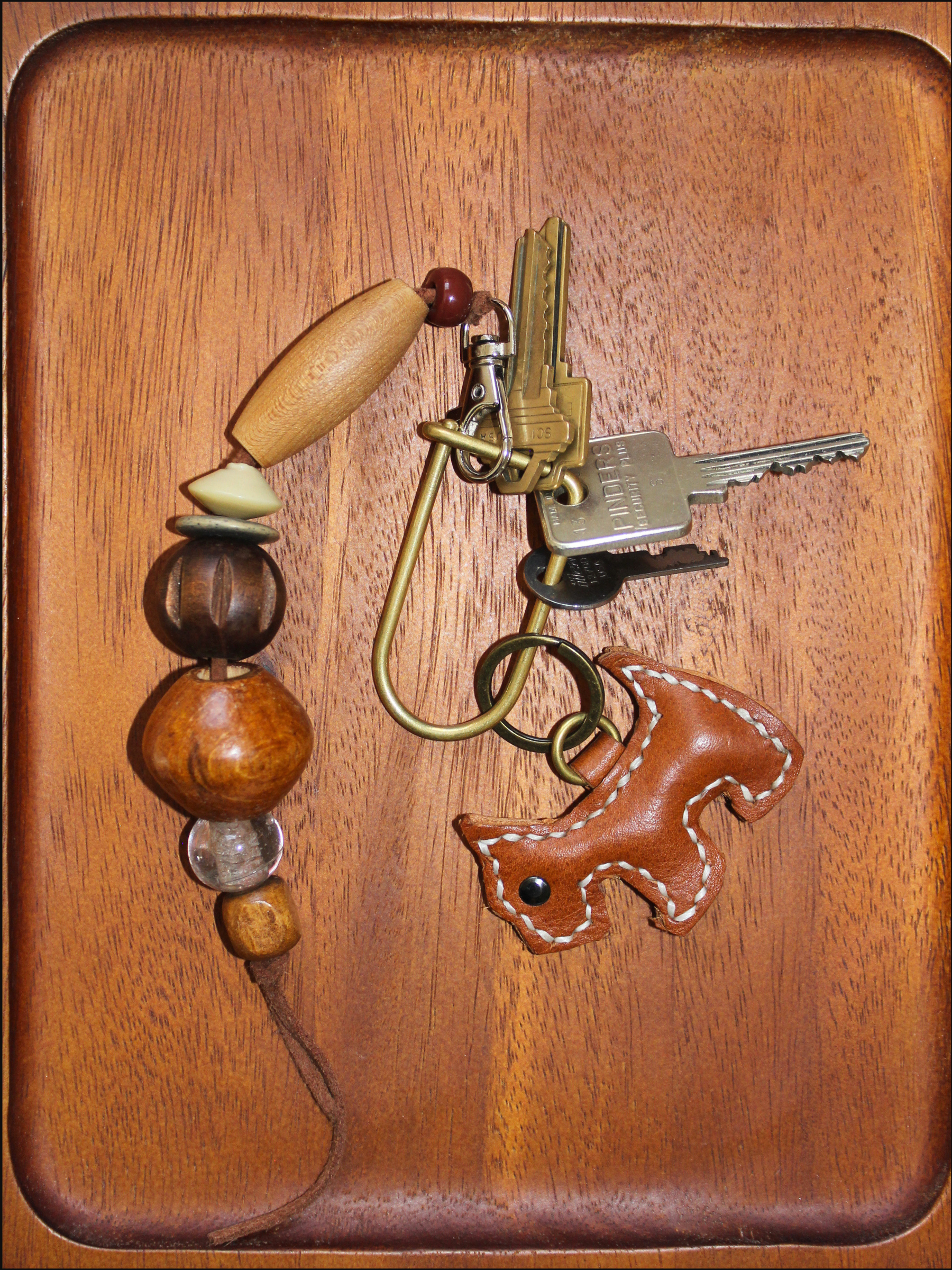 cognac dog leather keychain cover.png