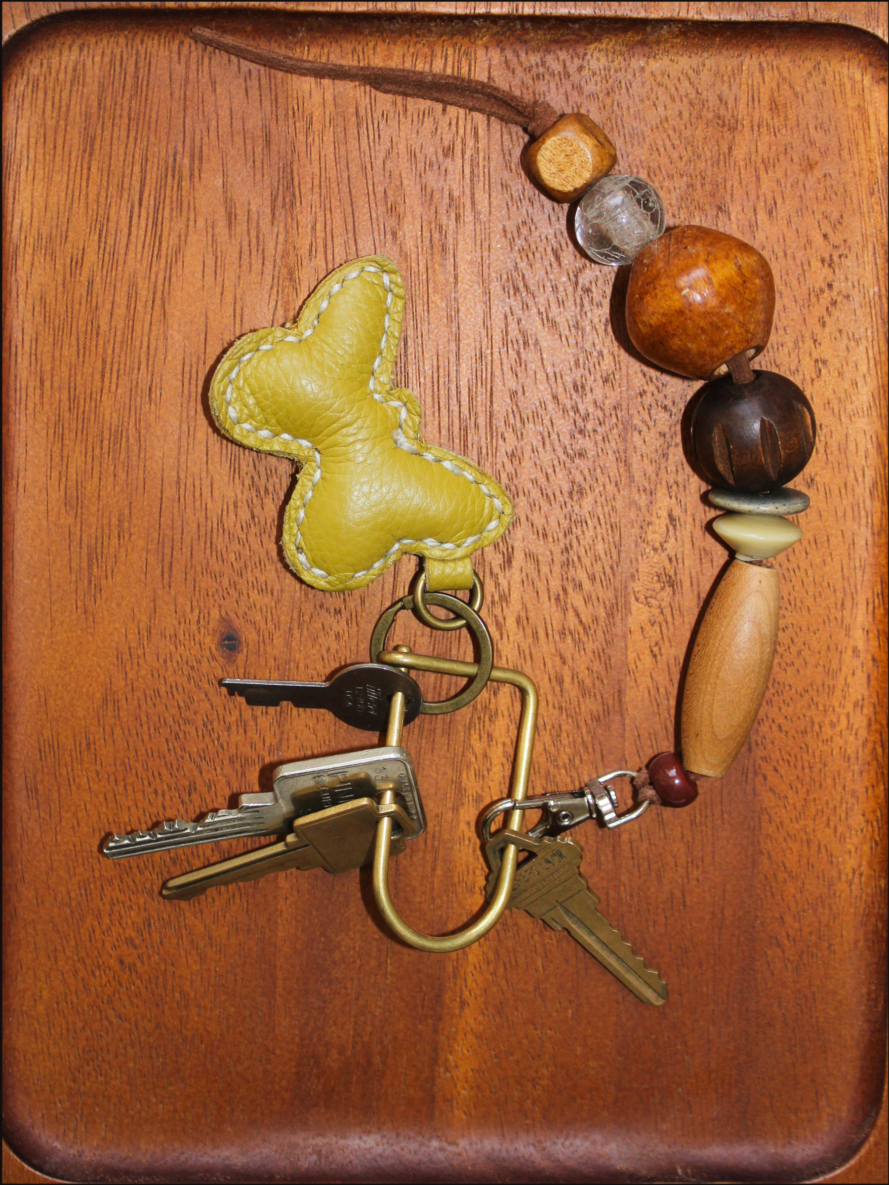 yellow butterfly leather keychain cover.png