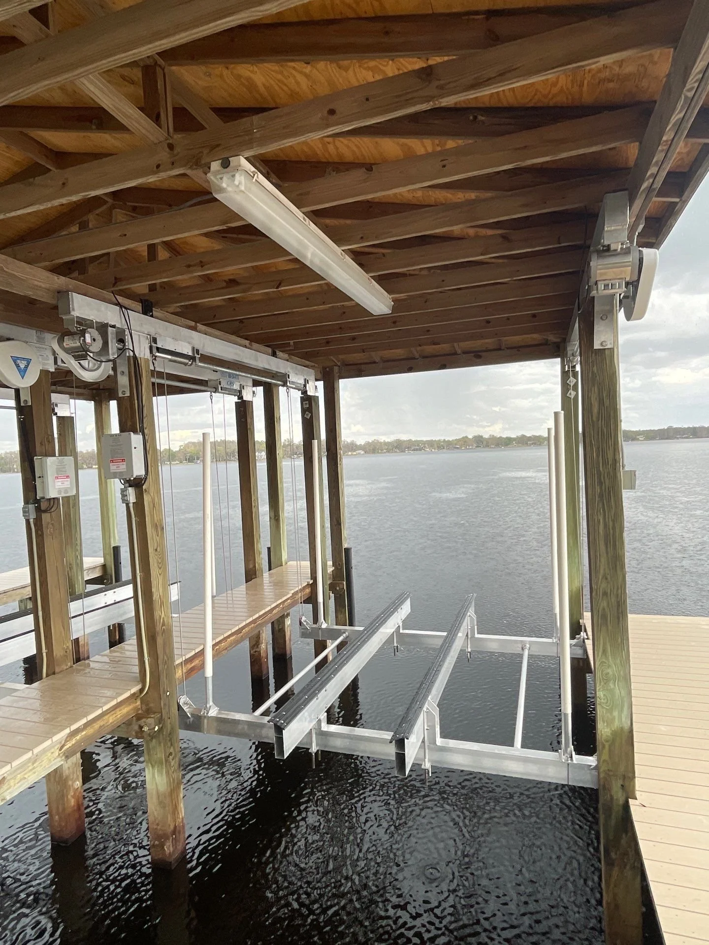New boat lift installation completed for a waterfront property in Odessa, Florida.