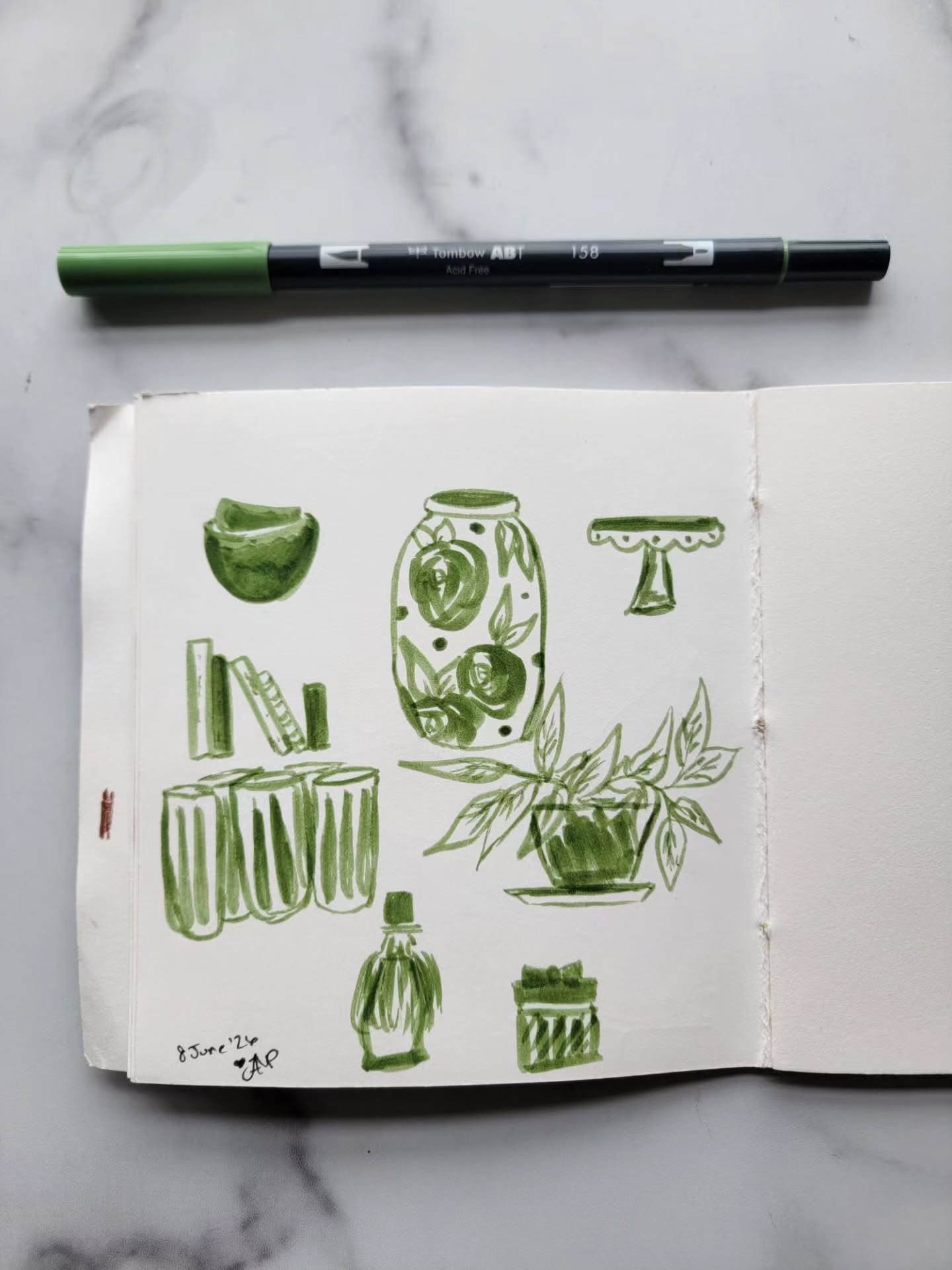 10 minutes + 1 marker = Creative Practice 🎨

While sitting at my kitchen island and as my kiddo worked through his math lesson for the day, I grabbed a marker and started sketching random stuff I saw.

No need for perfection.

Just time brushing the