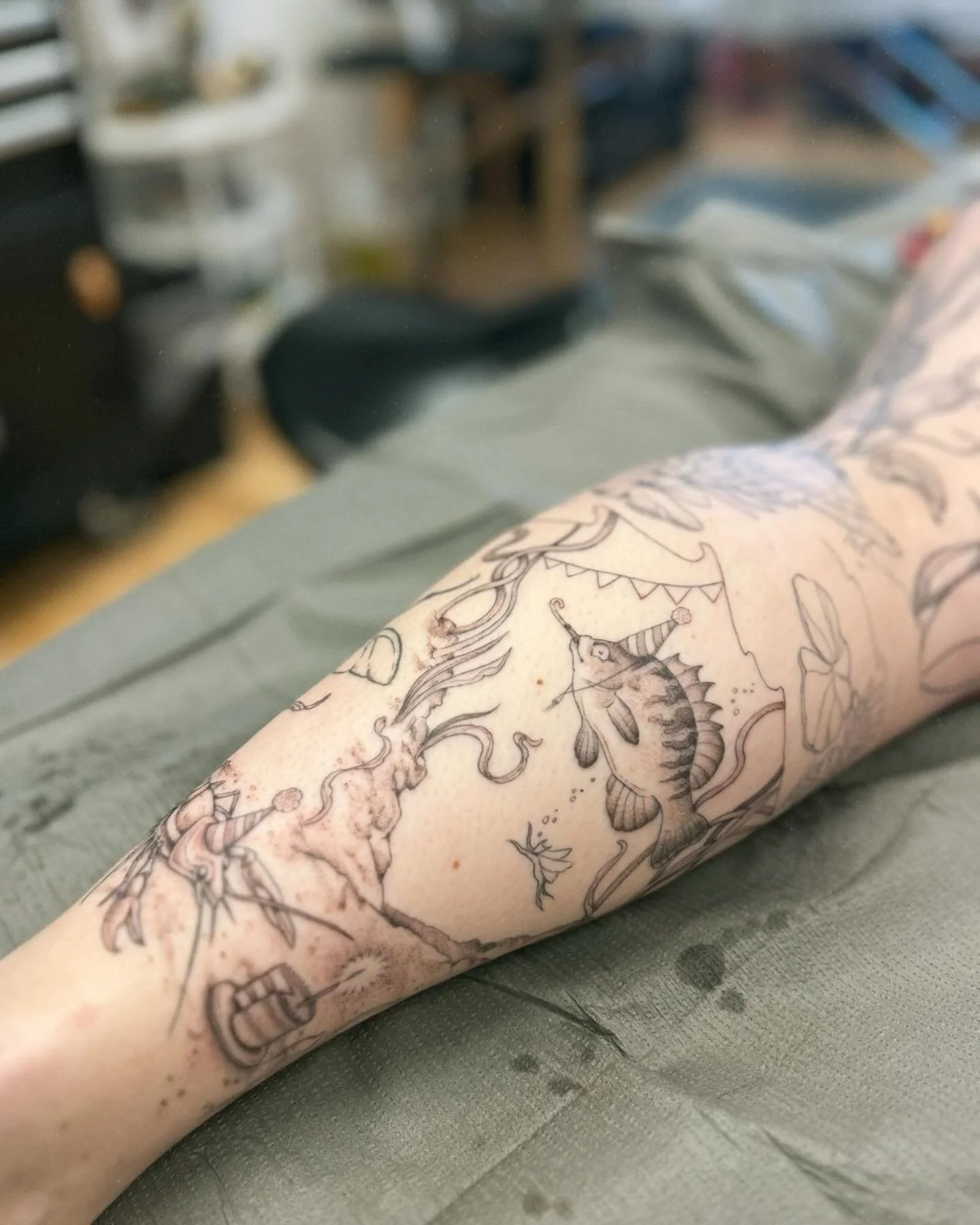 Slowly but surely working away on Hayley&rsquo;s disco/faery/ontario botanicals/swamp/crayfish birthday leg sleeve. This sunfish is a very supportive friend who showed up to the birthday party but is feeling a bit anxious, socially.. Bless him