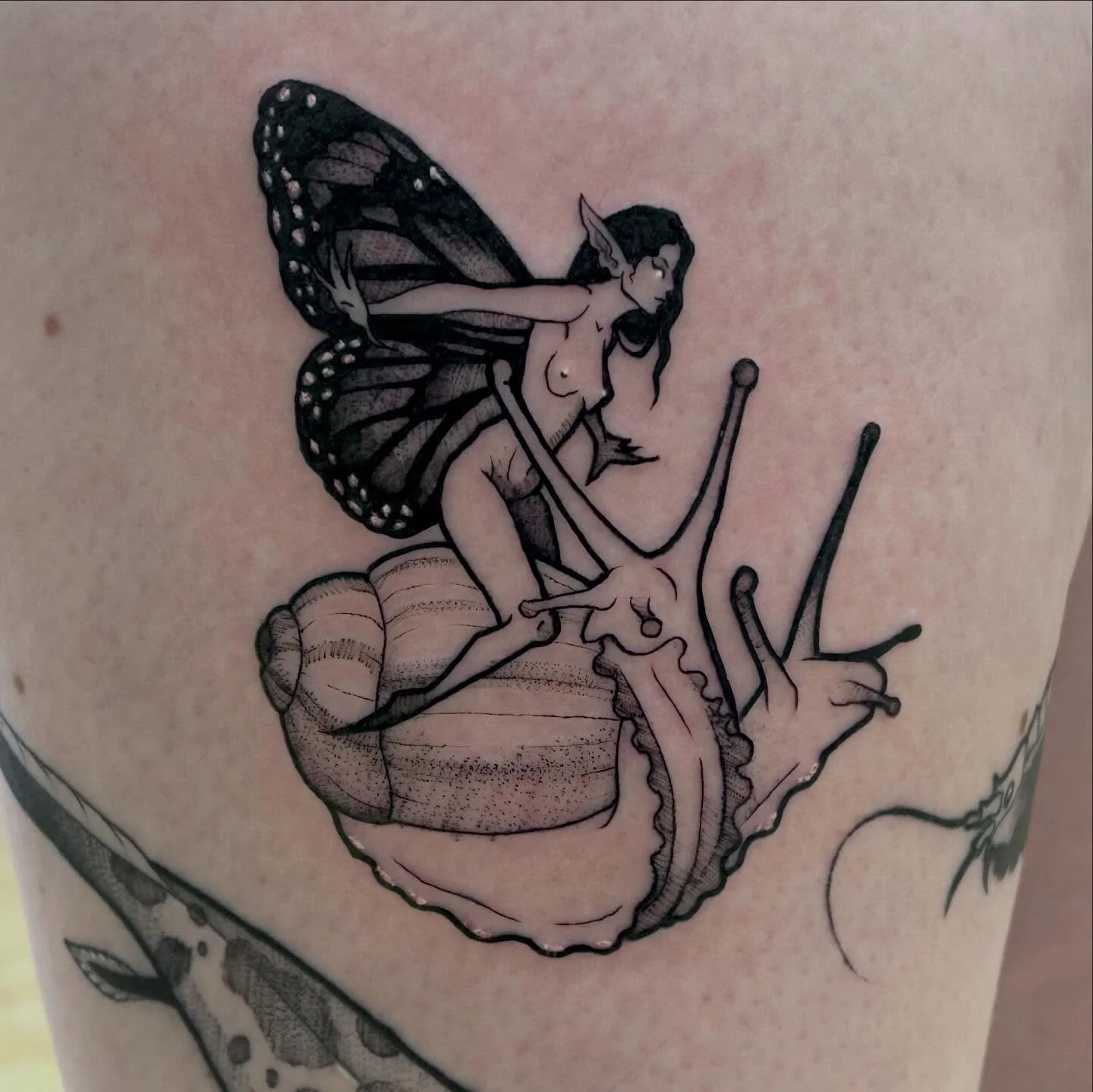 Fairy and snail, from a get-what-you-roll 🖤 made at @springfevertattoo