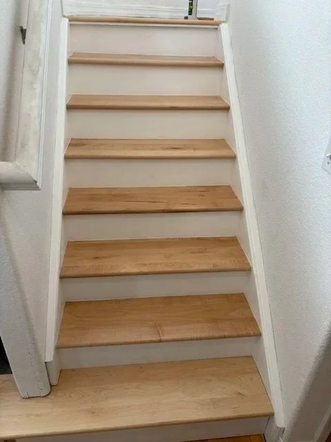 After: maple treads with painted skirts and risers