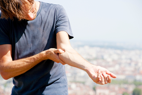 #1 Chiropractor in Midtown Kansas City Treats Golfer's Elbow (Medial Epicondylitis)