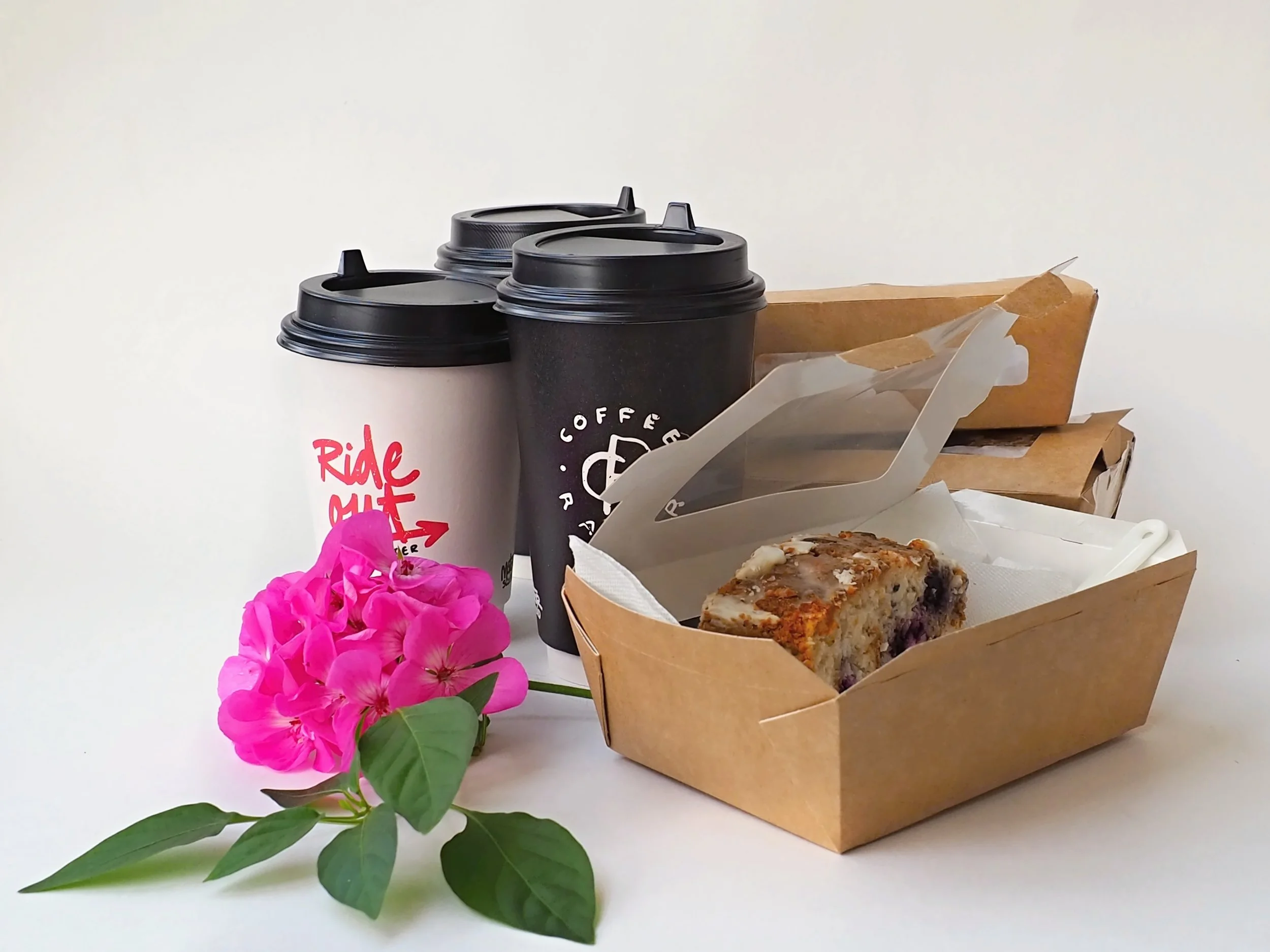 coffee-cups-and-blueberry-cakes-in-boxes-purchased-2022-11-17-09-19-56-utc.jpg