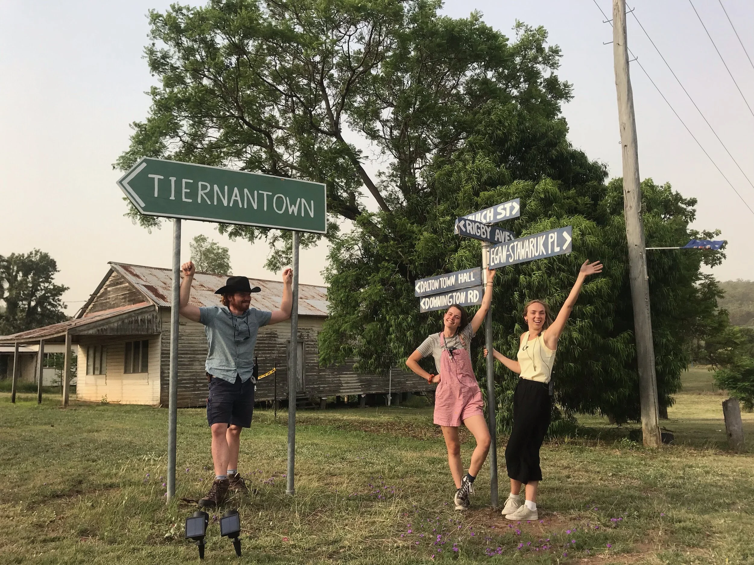 With the Production Department and their personalised street sign for 'Two Heads Creek'