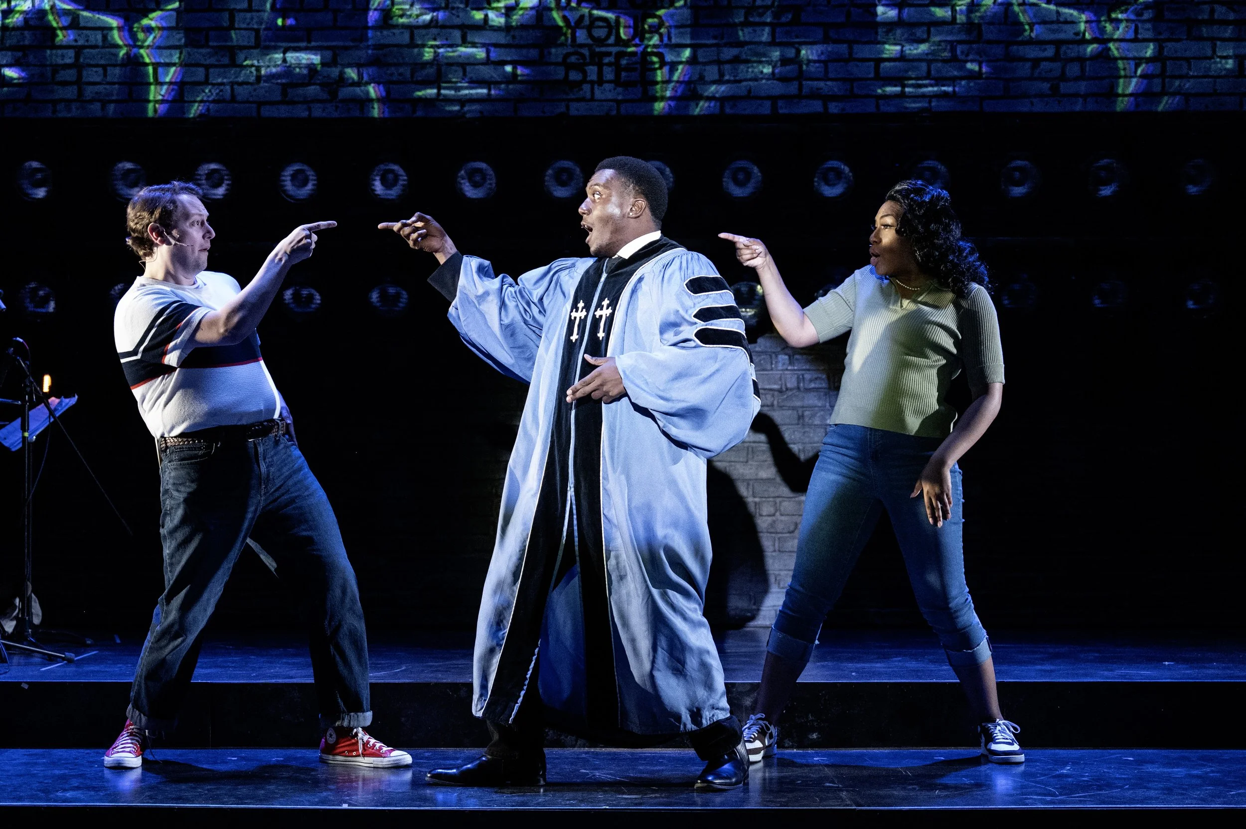  Solomon Parker as Rev. Doctor (center) with ensemble members Harrison Smith (left) and Nia Savoy-Dock. Photo by Teresa Castracane Photography. 