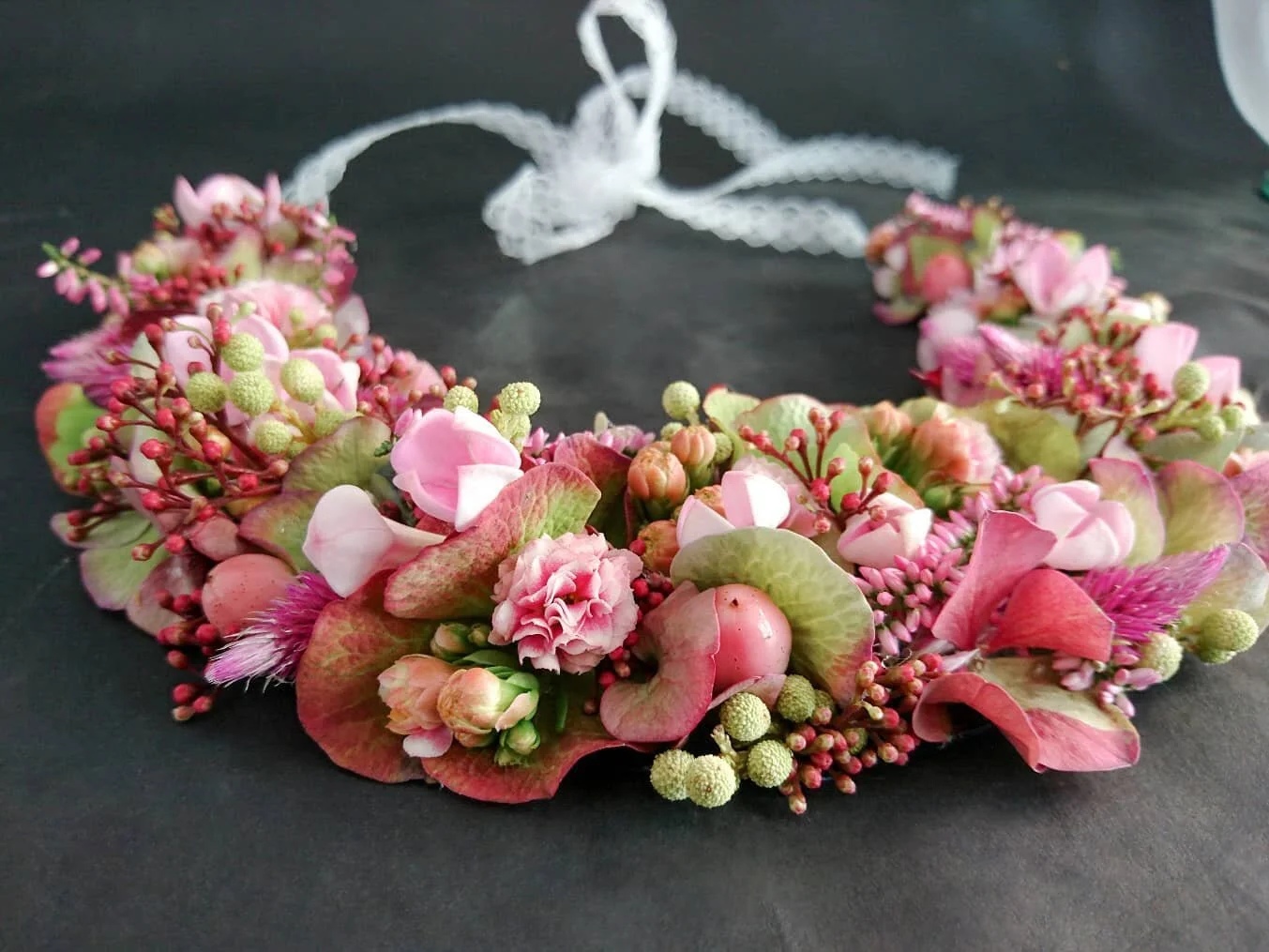 Going through old photos and came across this, the only decent photo I took of a necklace I made while working at the shop a few years ago. Hydrangea florets, kalanchoe, bouvardia, skimmia, iperico, erica, celosia, and other berries. There's so much 
