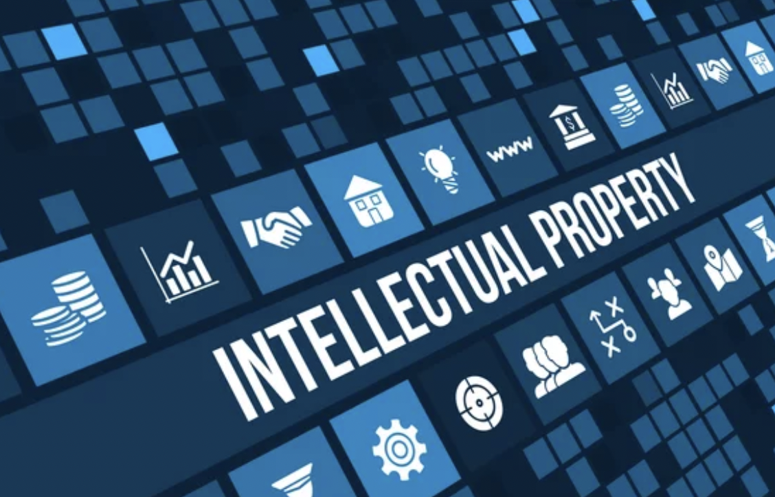 Digital graphic with icons representing various aspects of intellectual property, including patents, trademarks, copyrights, and innovation, surrounding the central text 'Intellectual Property'.