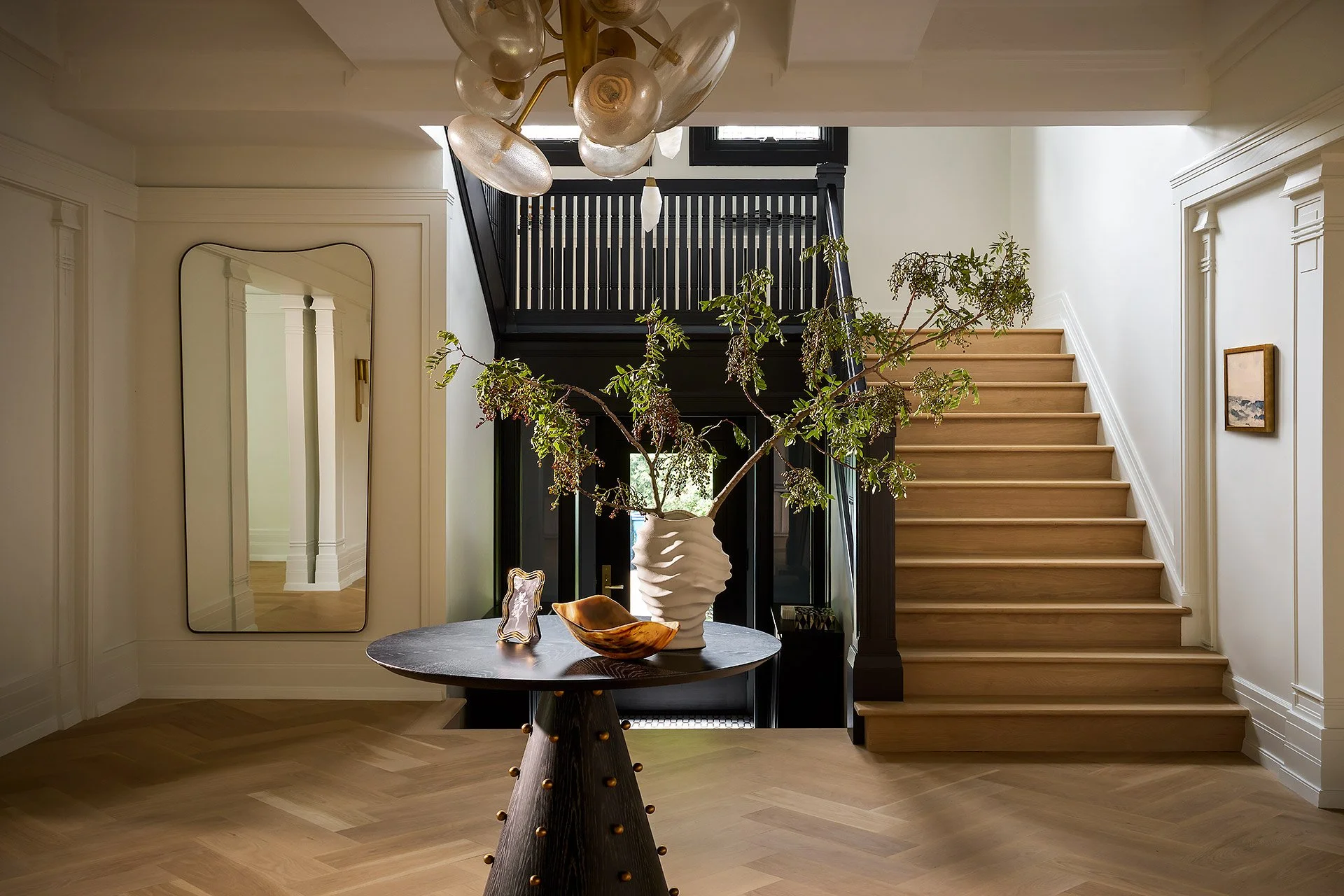 Luxury contemporary foyer design showcasing modern architecture and high-end interior finishes, back view.
