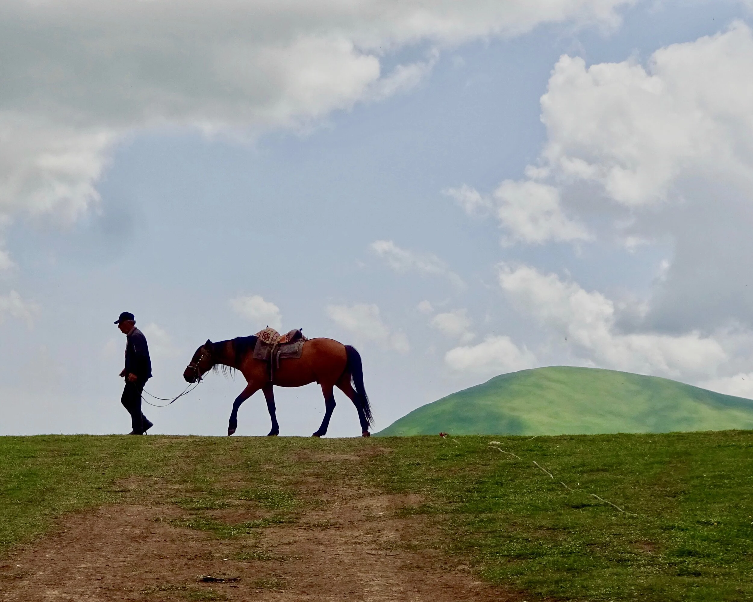 Man and his Horse Gudauri, Republic of Georgia.jpeg