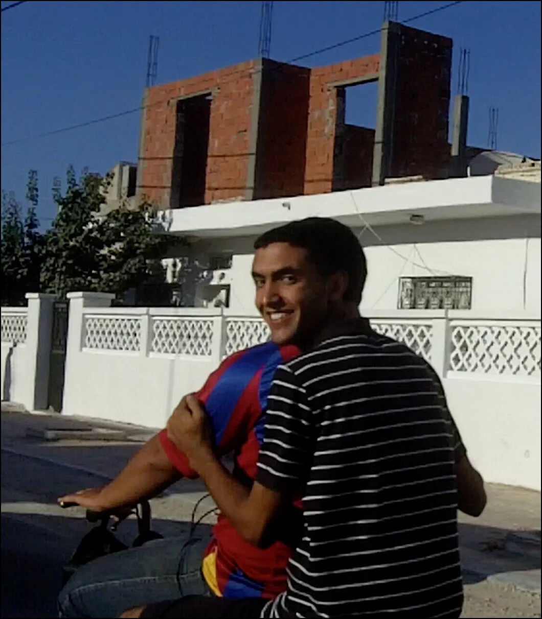 Tunision boy on motorcycle .jpg