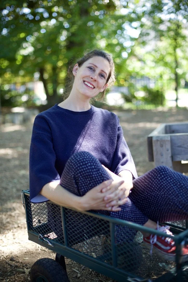 Vaila Finch, founder of Curios, smiling outdoors