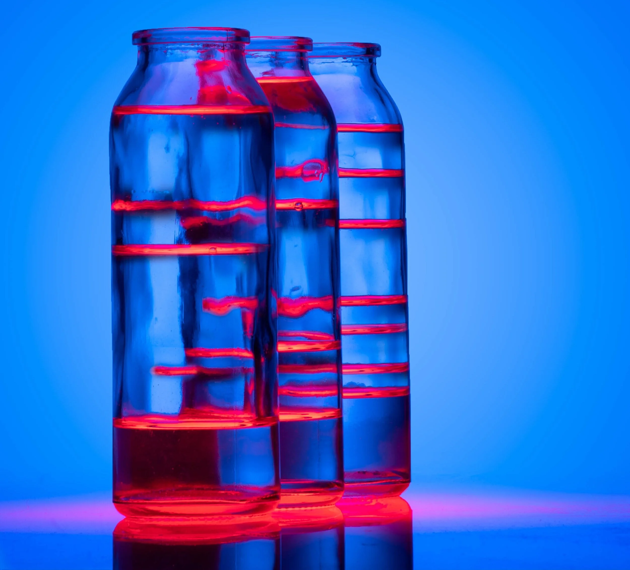 Clear product bottles three