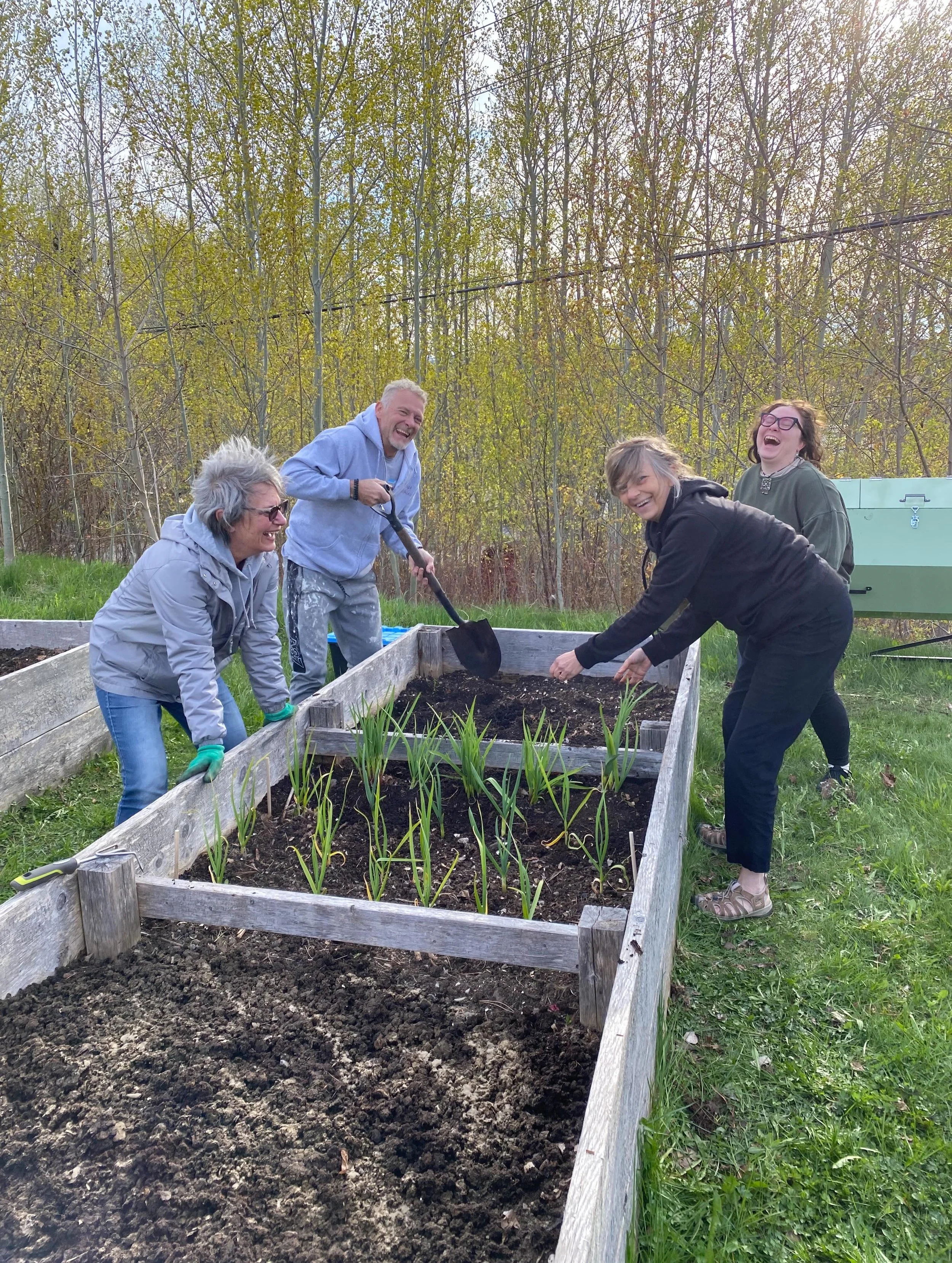 There was just a little bit of silliness at the Reid Street Community Garden last night! 

We had beautiful weather and the best kind of company for getting the garden ready for planting. We added lots of compost to the beds, picked up litter, plante