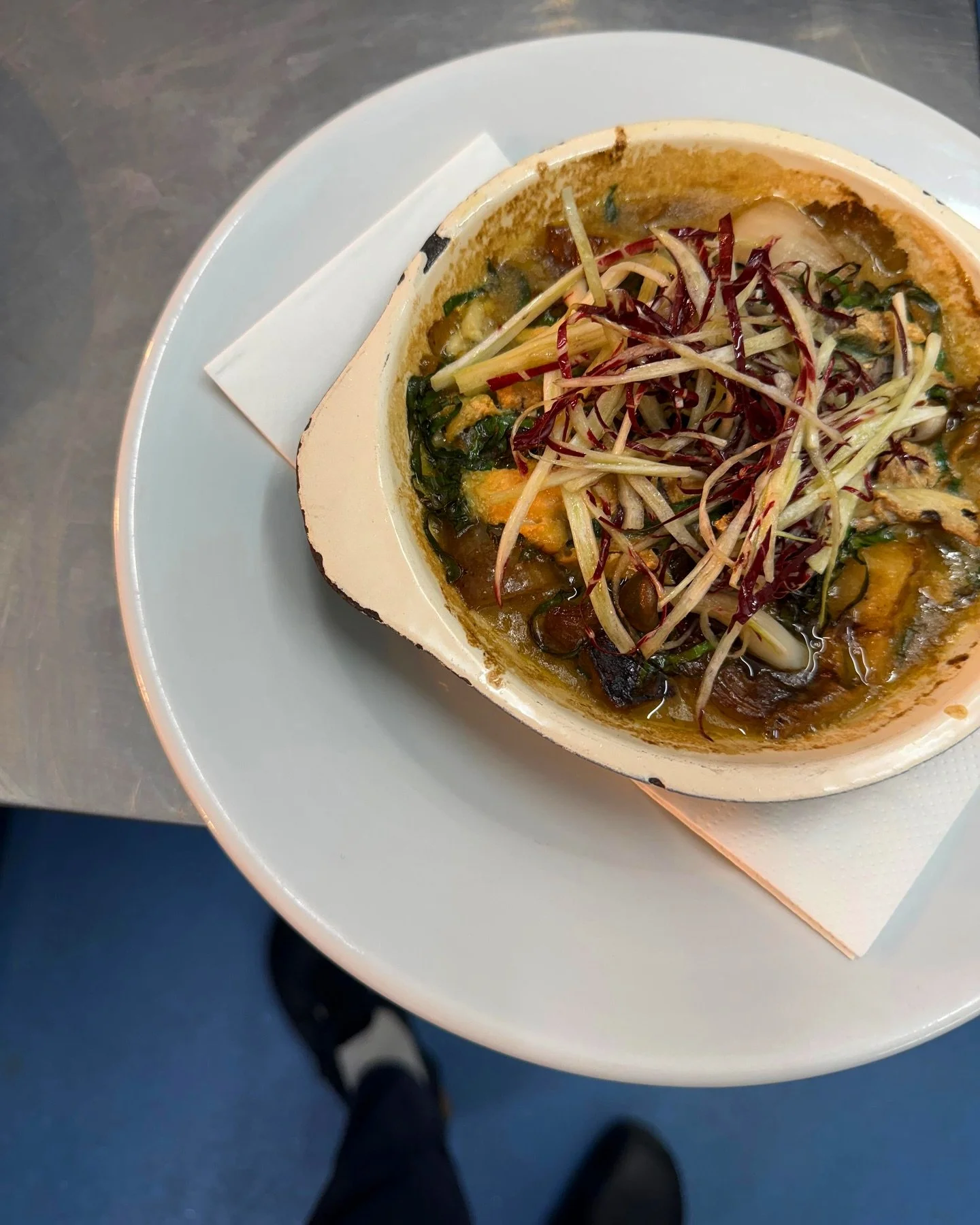 A new dish on the menu this week - wild mushrooms, celeriac, roscoff onions and takeggio.

We start by saut&eacute;ing chanterelles and trompette mushrooms in garlic butter. Then we add some caramelised celeriac, roast roscoff onions along with a ric