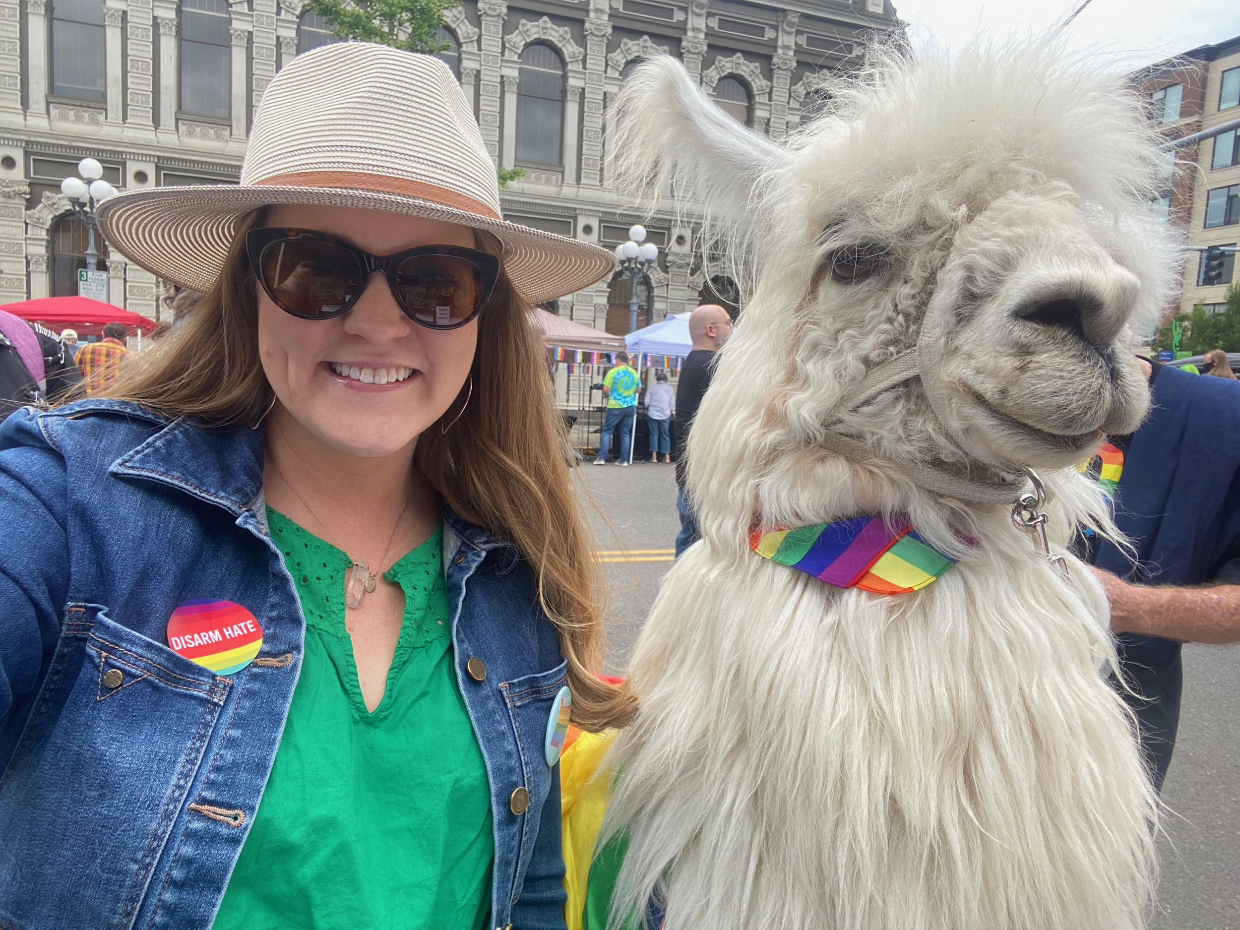 Ashley Carson Cottingham at the Salem PRIDE event - a celebration of LGBTQIA rights - pictured with Caesar the No Drama Lama