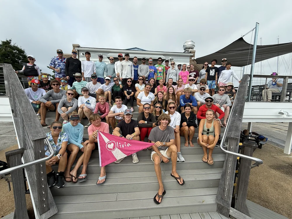 Competitors gathering for a group photo at the 2025 Olivia’s Team Racing Invitational held at Severn Sailing Association.