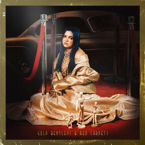 Gabriella Zauna explores her newest creation, "Gold Bentleys and Red Carpets" - Interview