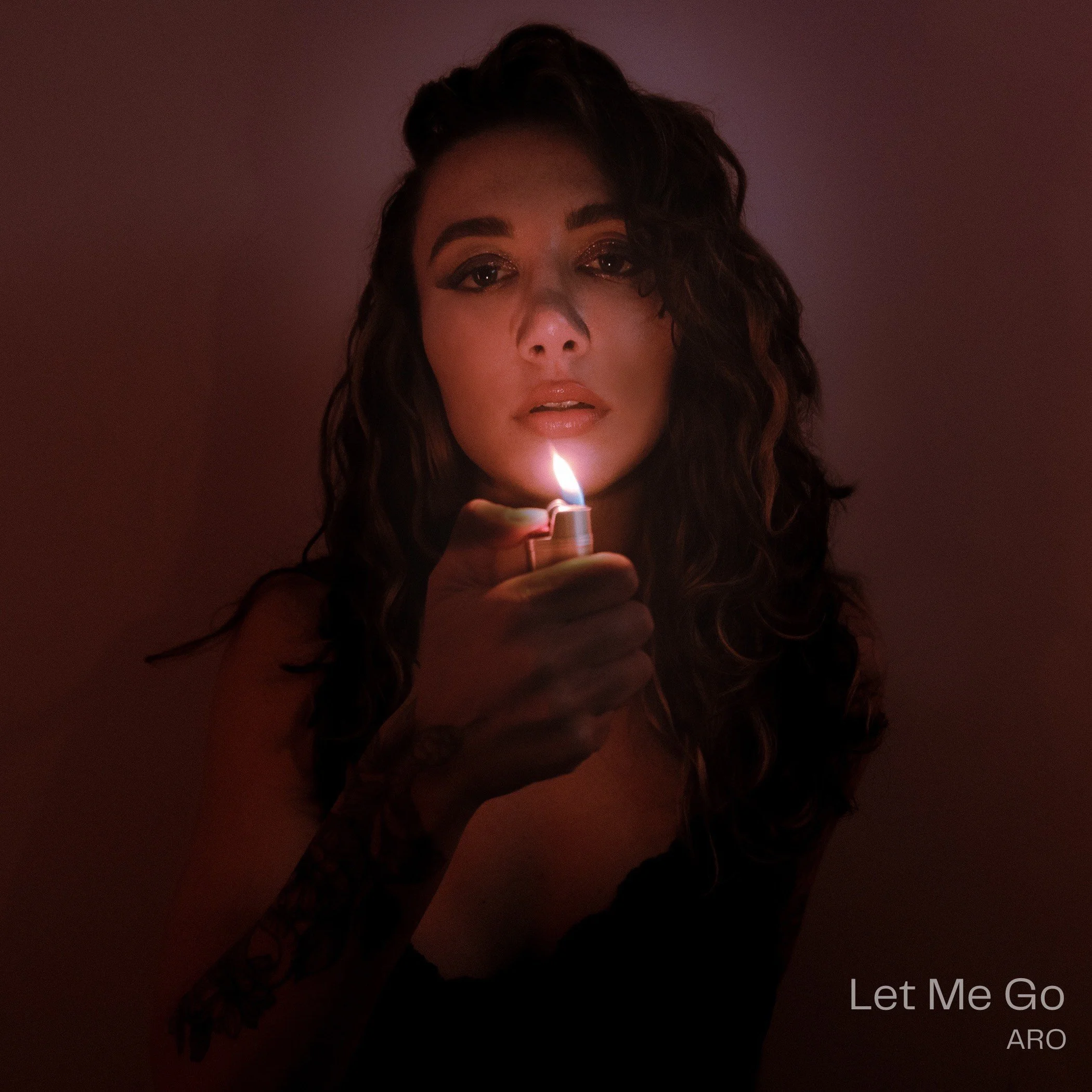 ARO's debut single "Let Me Go" captivates with haunting story of heartbreak