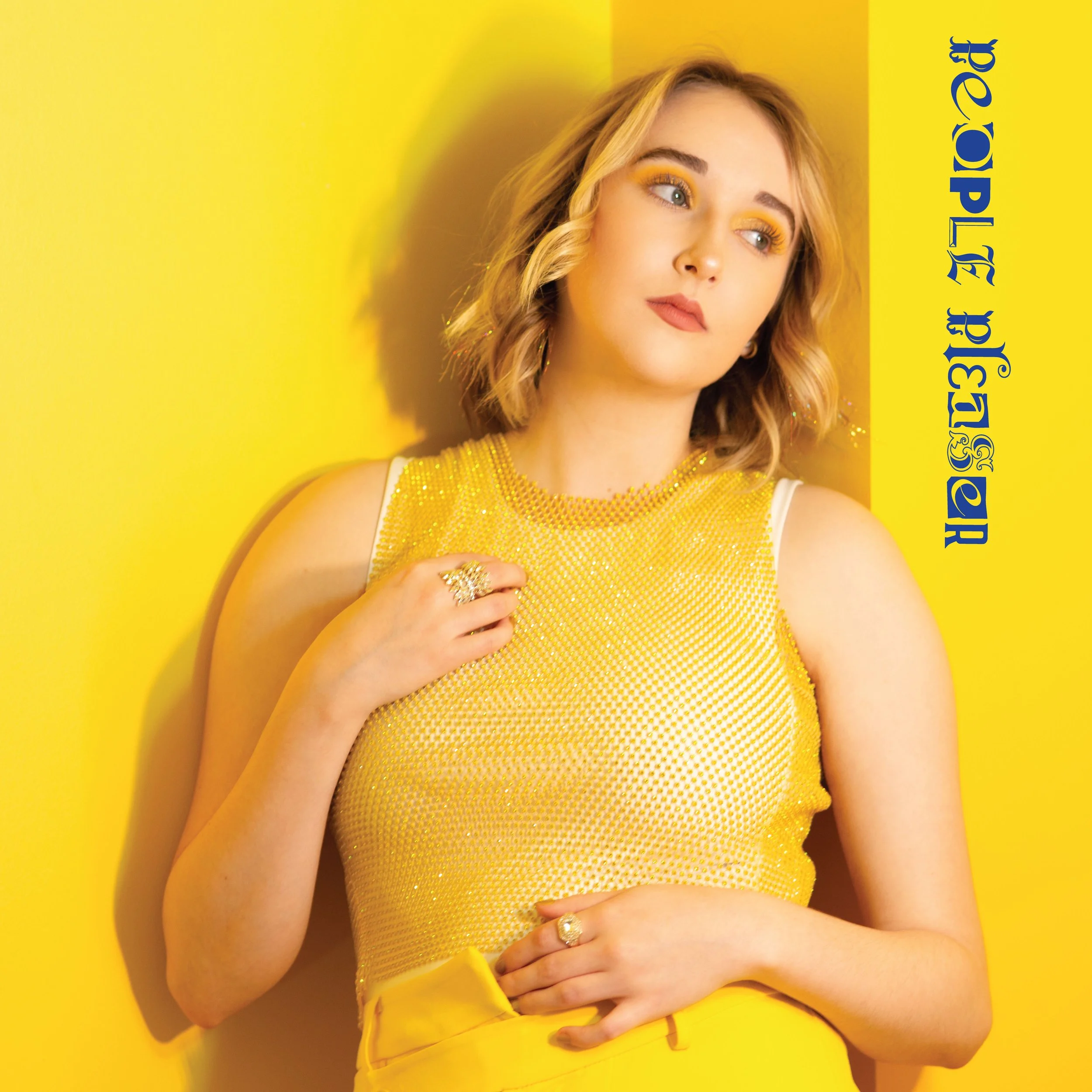  Ainsley Costello empowers on explosive single, "People Pleaser"