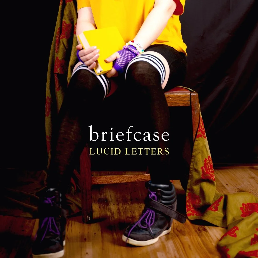 Lucid Letters flips the script with a sharp &amp; playful single, “Briefcase”