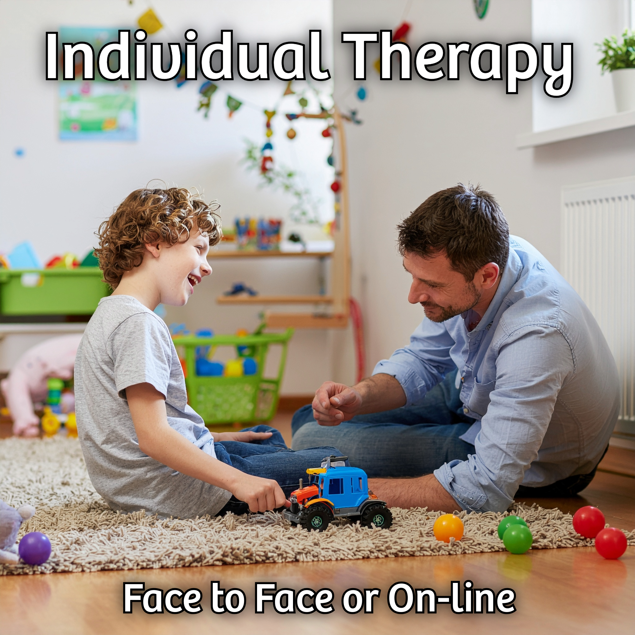 boy and male therapist playing with vehicle together in play therapy room