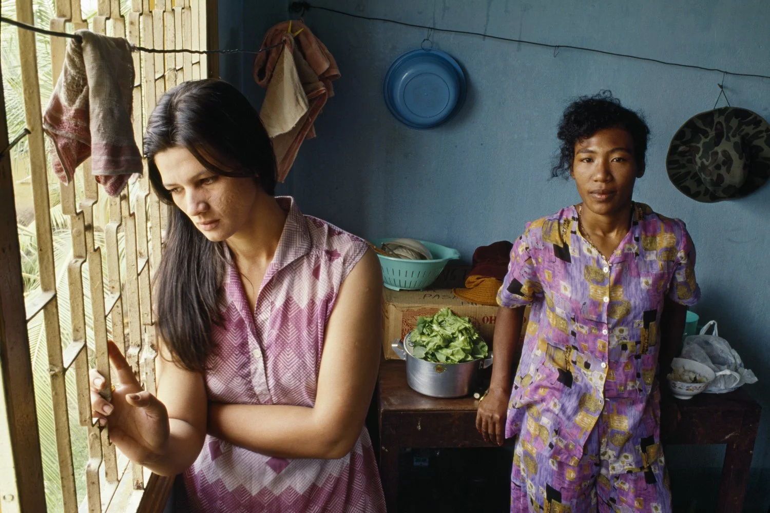 BY 1994, MORALE WAS LOW. AT THE AMERASIAN TRANSIT CENTER IN SAIGON, NGUYEN THI THU BICH LAN AND KIEU OANH WAIT WITH LITTLE HOPE OF BEING ABLE TO LEAVE FOR THE US.