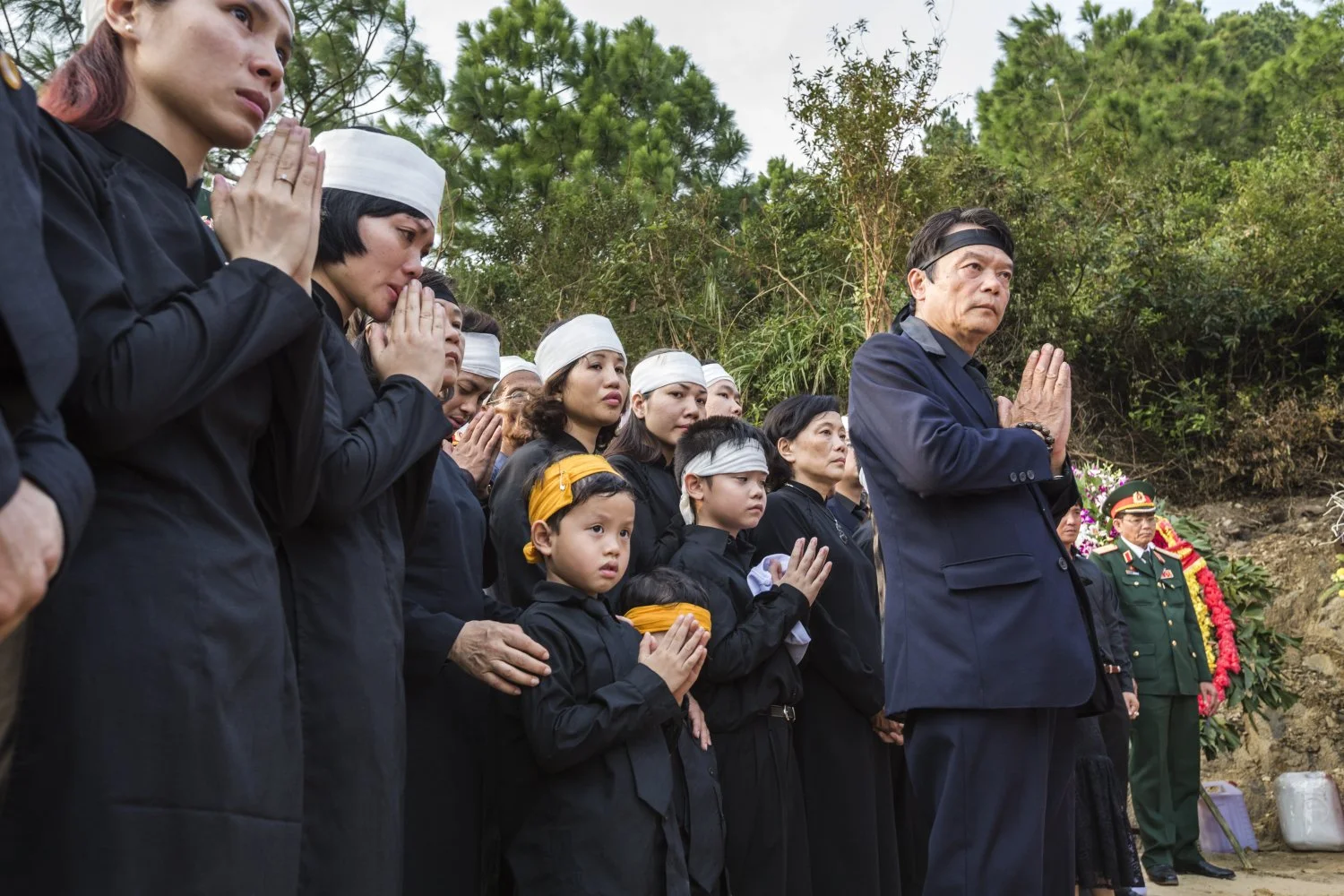FAMILY OF GENERAL GIAP AT HIS GRAVE, 2013