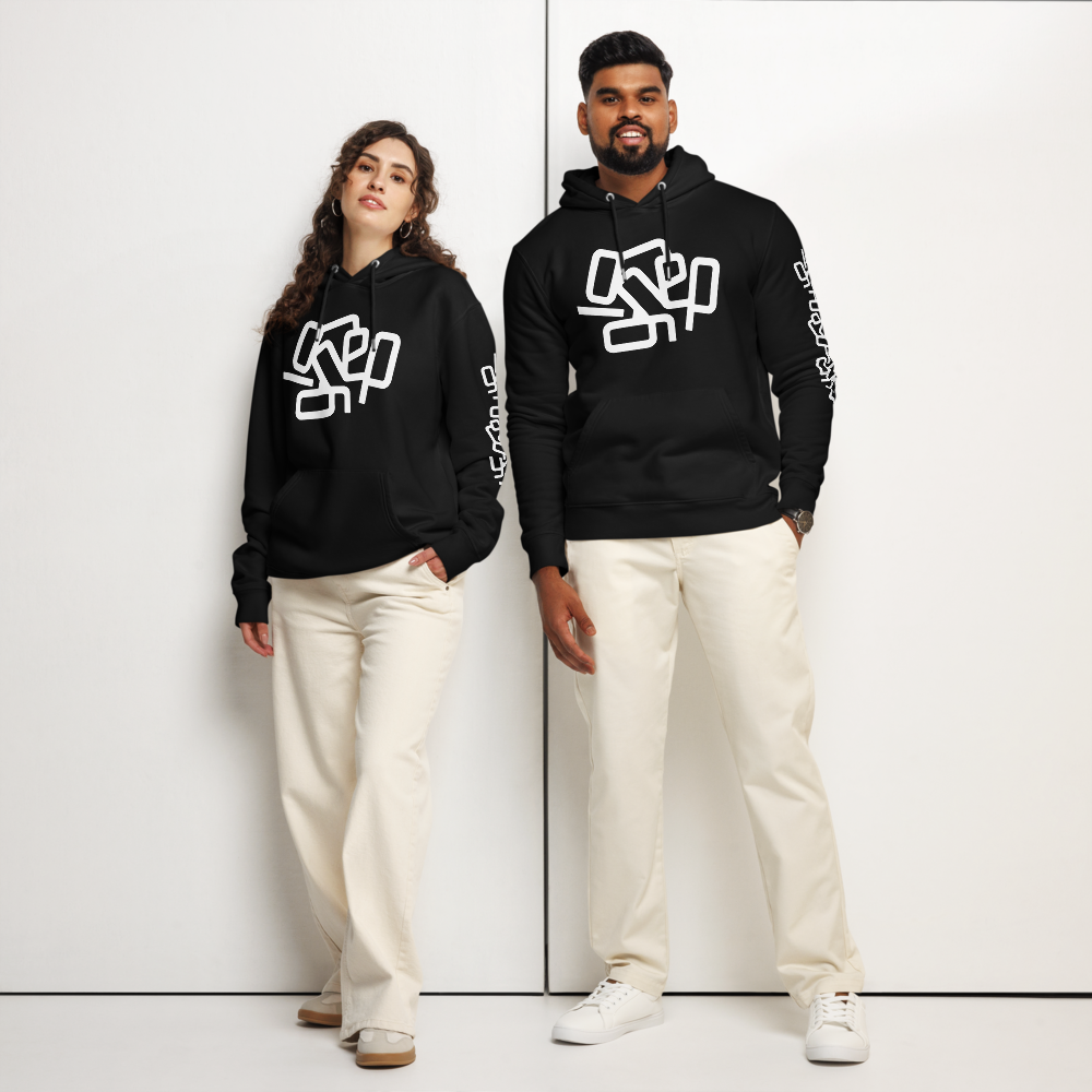 Ignored hoodie – male and female models wearing matching black Typowear hoodies. Minimalist visual expression of quiet resistance and mental clarity.