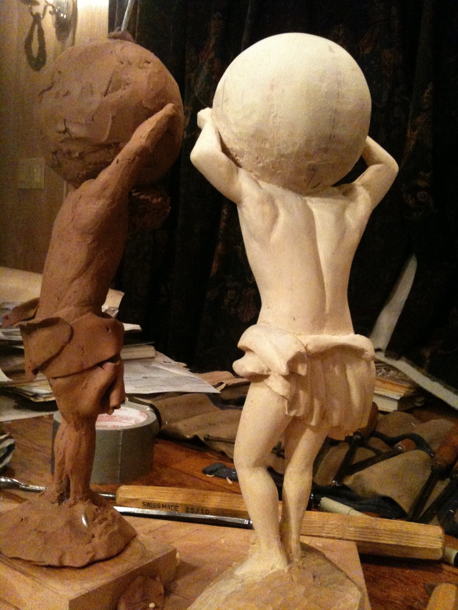 maquette and wood carved atlas.jpeg
