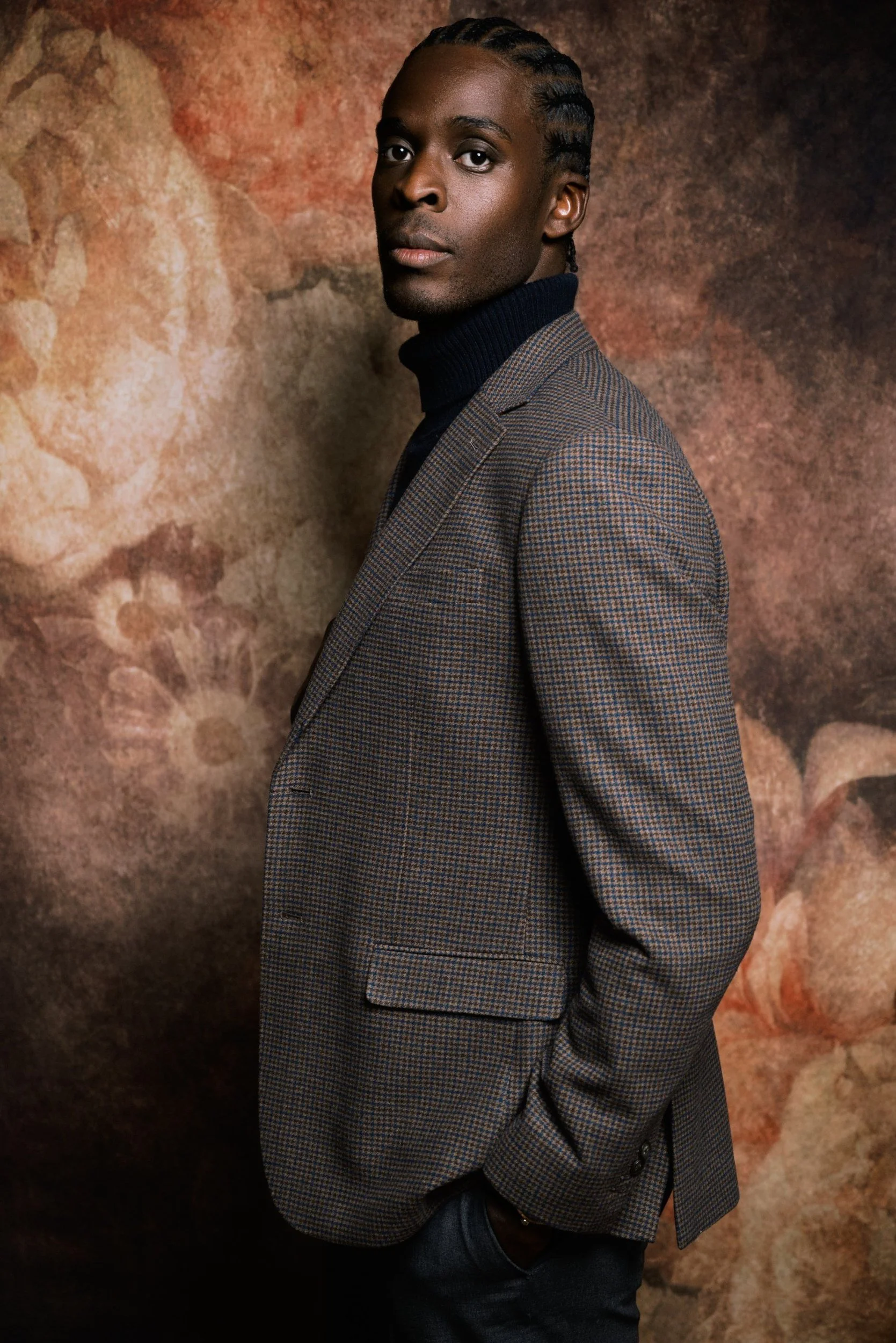 Menswear portrait against painted floral backdrop, Oklahoma City studio rentalFull body fashion portrait on white cyclorama wall at Lightbox OKC photo studio in Oklahoma City