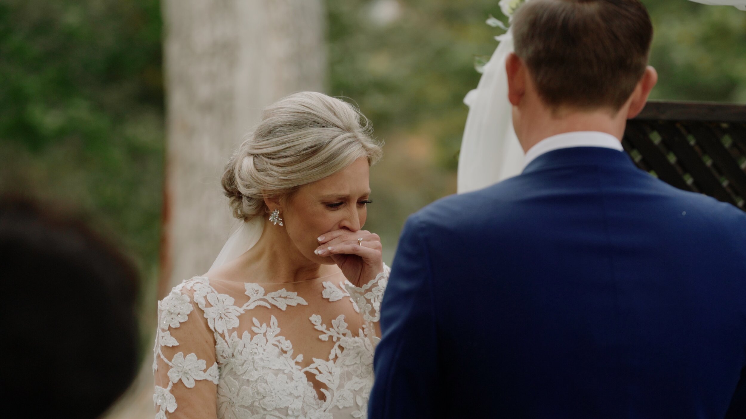 emotional bride cries during her wedding near St. Louis Missouri