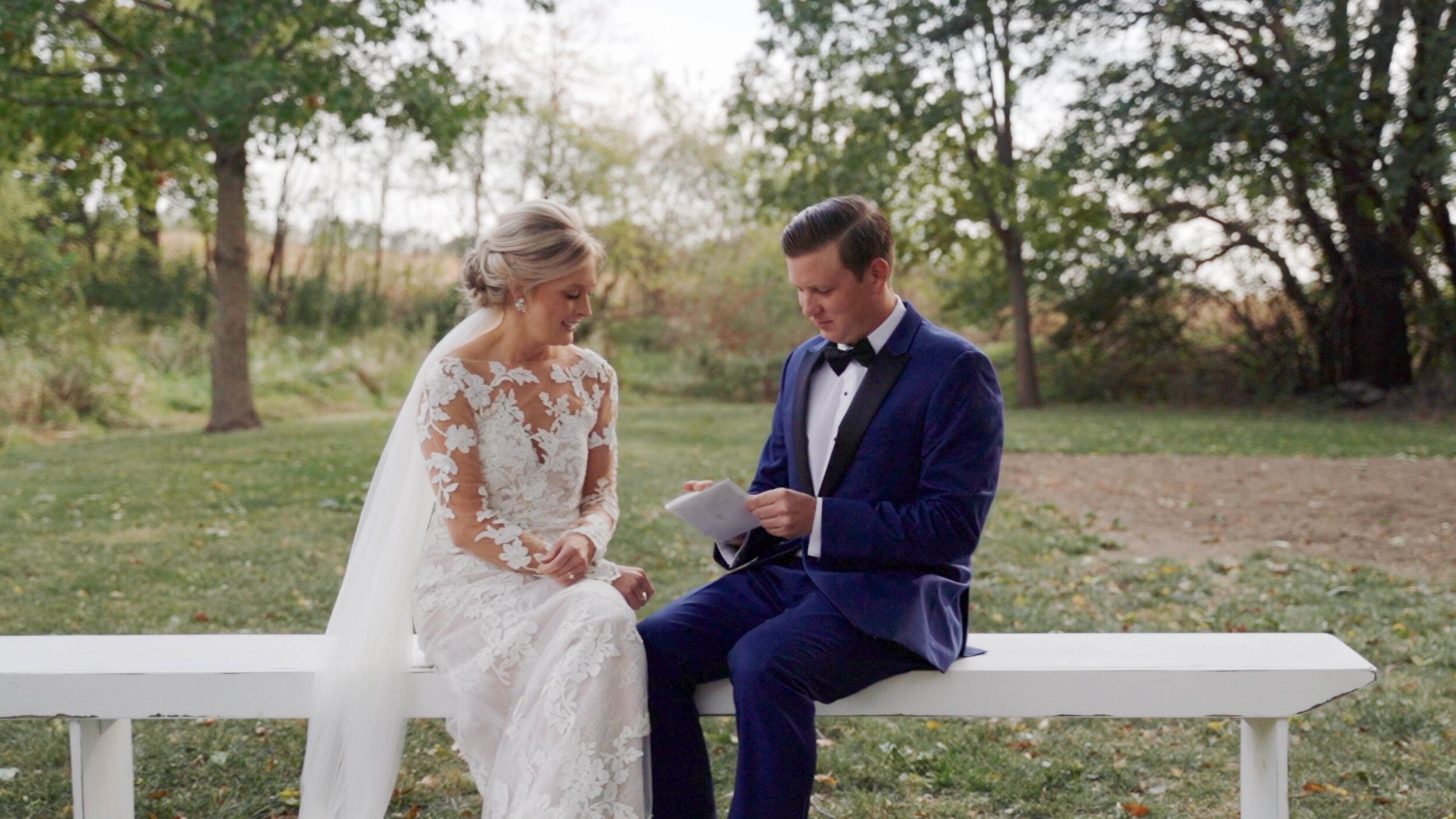 Stl wedding videography bride and groom reading letters