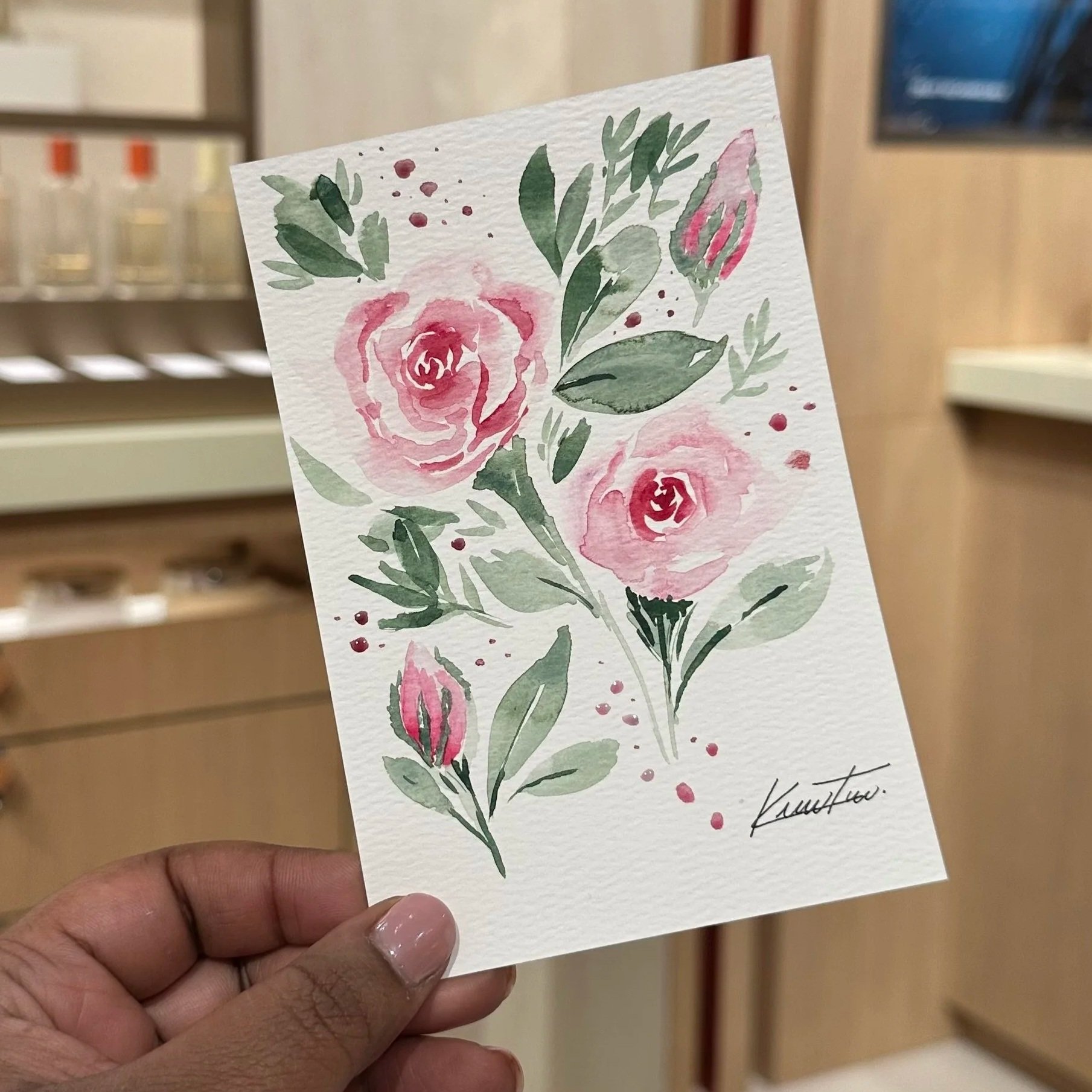 Watercolor painting of roses arranged in an elegant bouquet with fluid, expressive brushstrokes – Didi Letters, Montreal Artist

