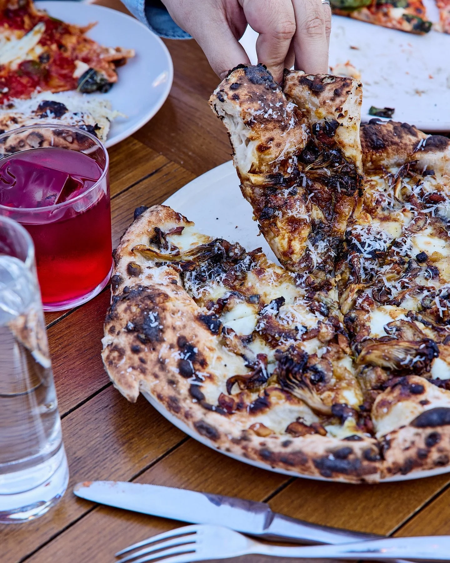 Saved you a slice. Al Funghi— with mushrooms, scarmorz, carmelized onions, bufala mozz, roasted garlic, and aged balsamic.