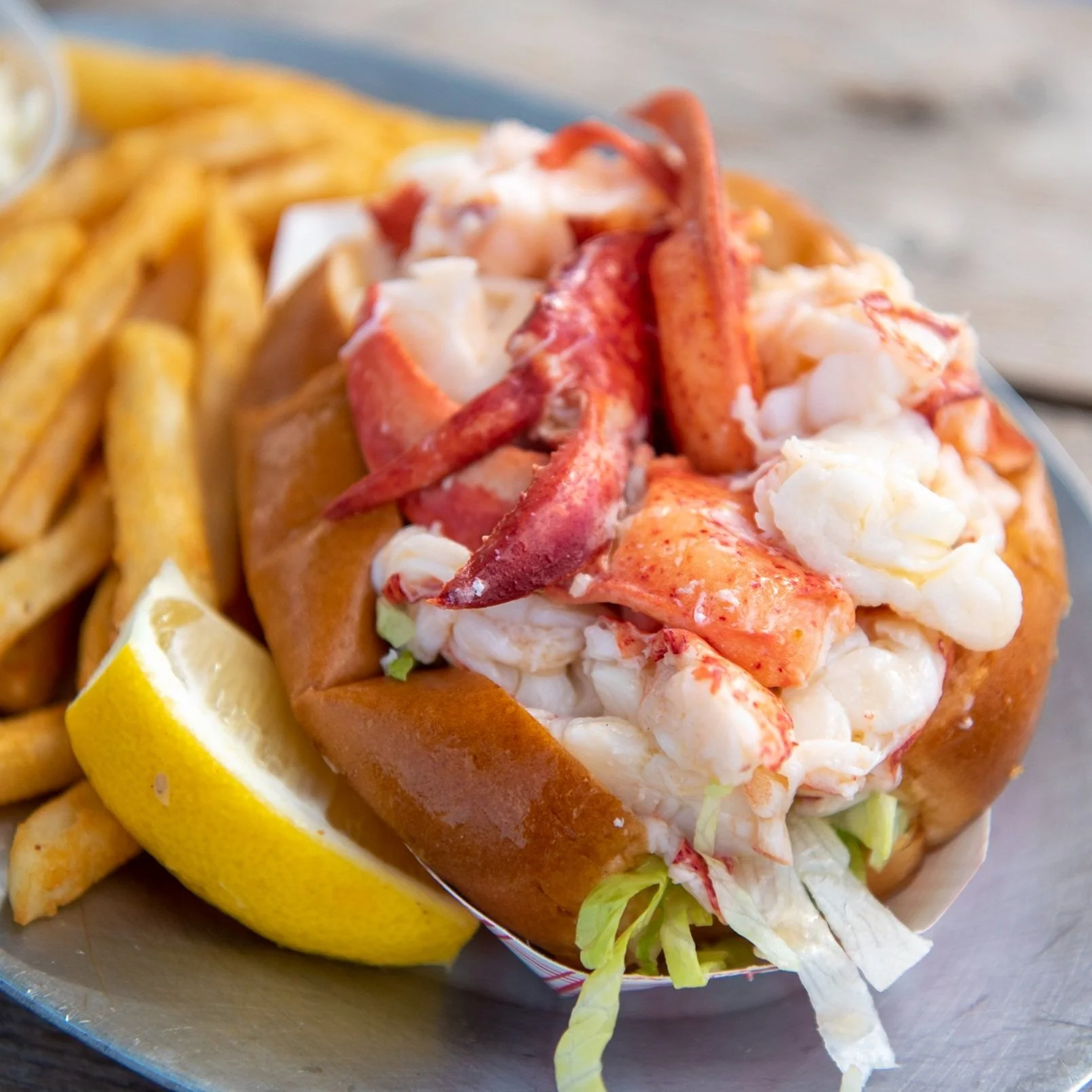 Lobster Rolls served with a bed of fries