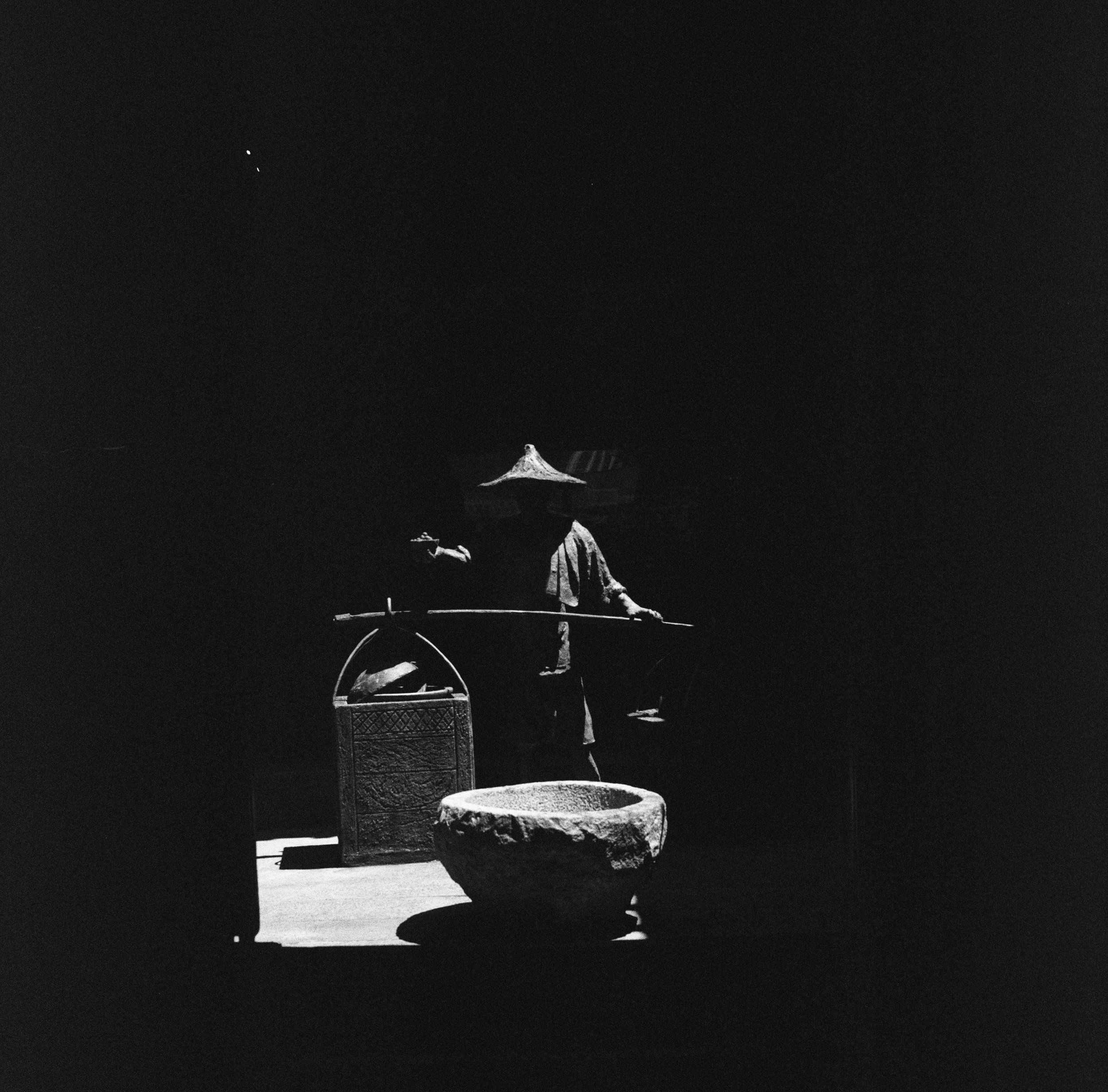 The man in the shadows