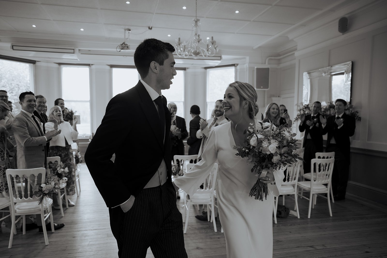 walking up the aisle.Winchester House, London. Images by Wildheart Photographer, London Wedding Photographer