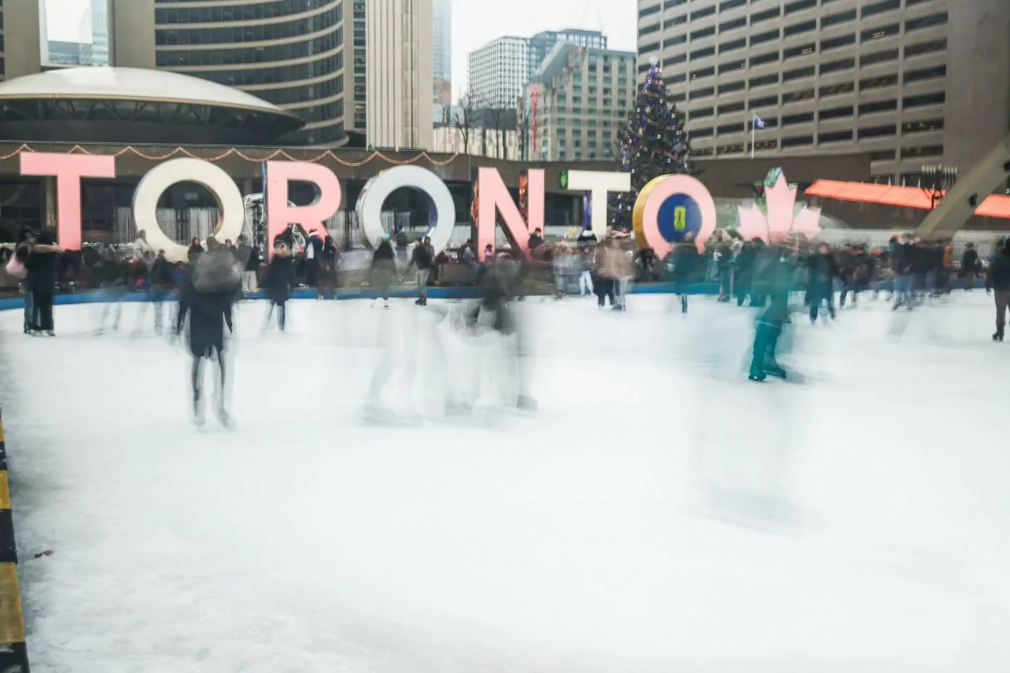 Took an adventure into the city the other day and had an idea. Camped out at Nathan Phillips Square and got the shot.

Merry Christmas and Happy Holidays everyone