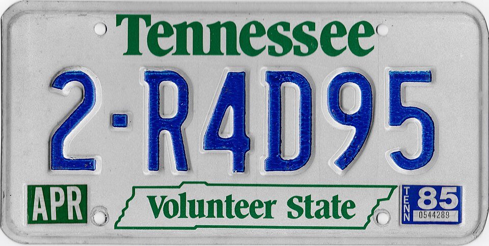 1985 Tennessee license plate with the motto “Volunteer State”